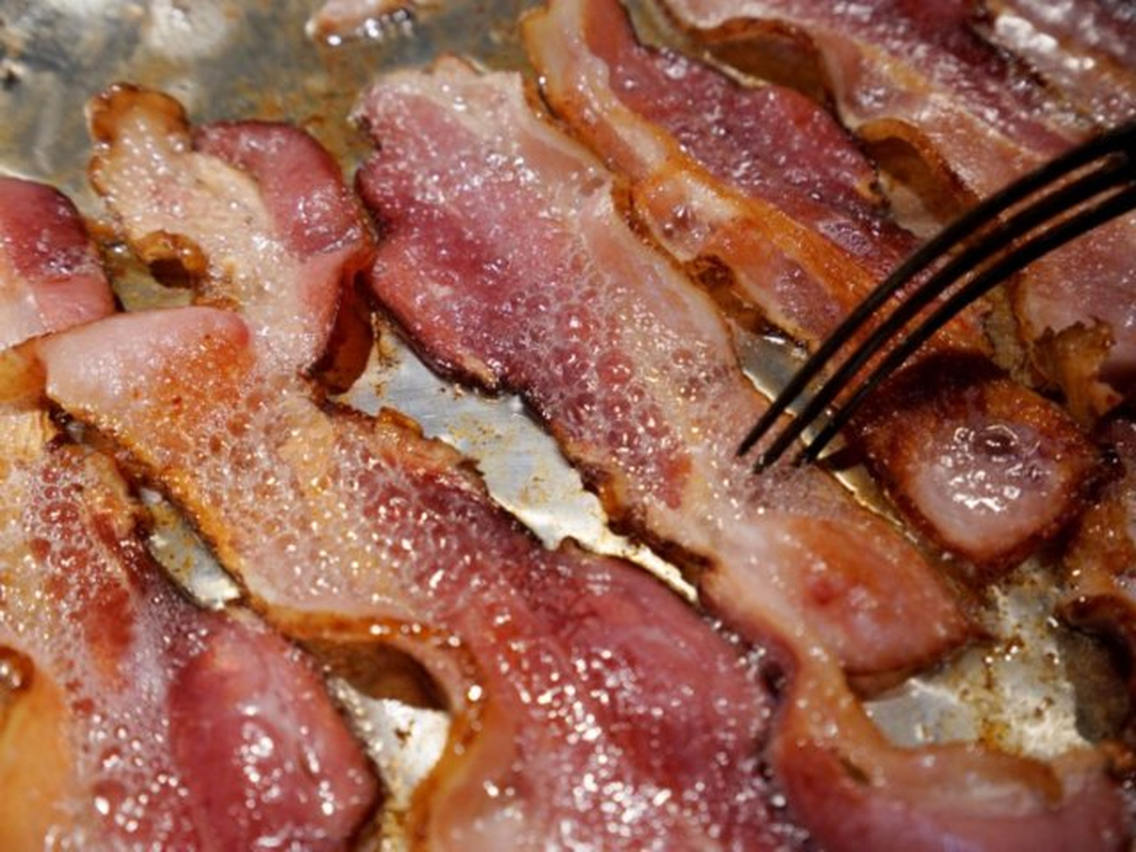 Bacon cocinándose