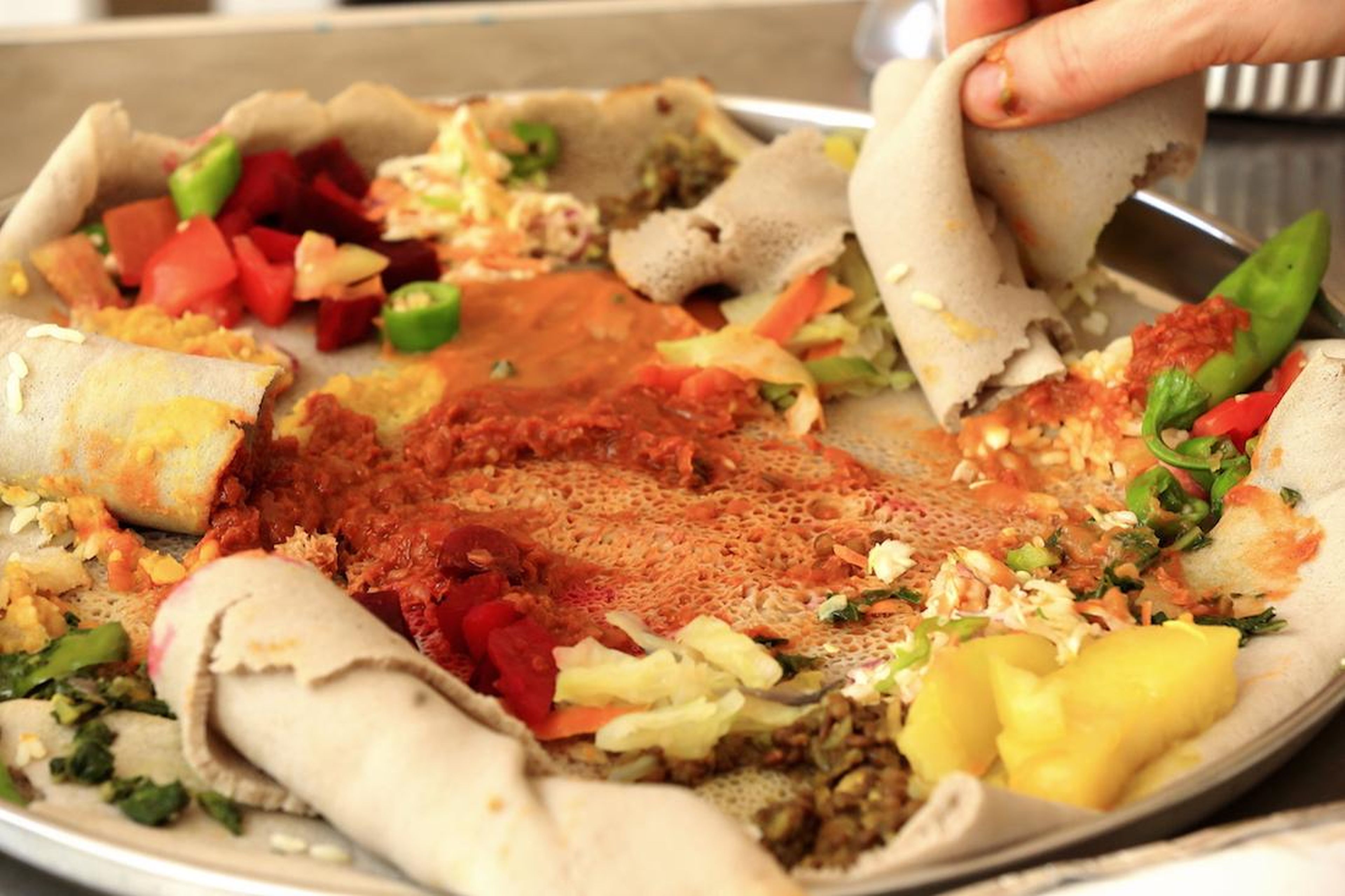 Ethiopians serve their meals atop a tart, fiber-rich bread called injera.