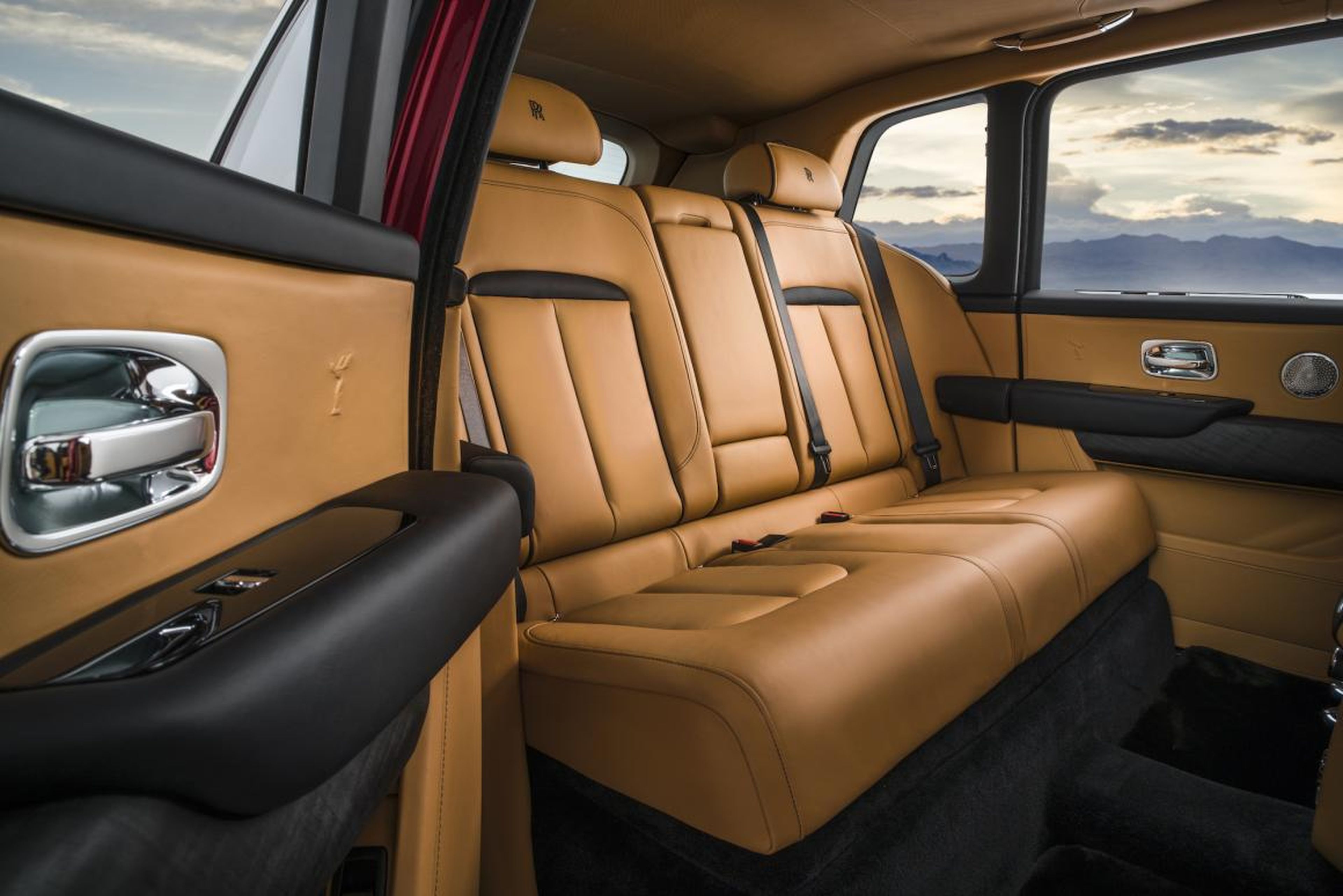 Open up the rear coach door and you'll find traditional Rolls-Royce luxury.