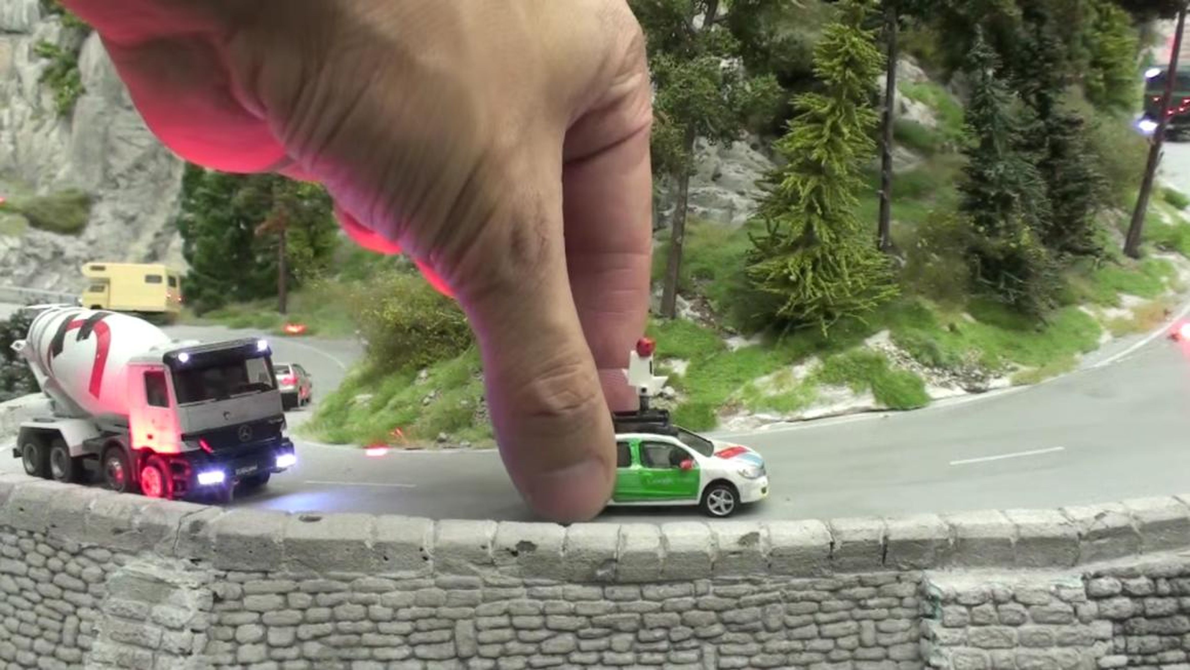 The Google car starts off on a road outside a replica of the famous Neuschwanstein Castle in Bavaria.