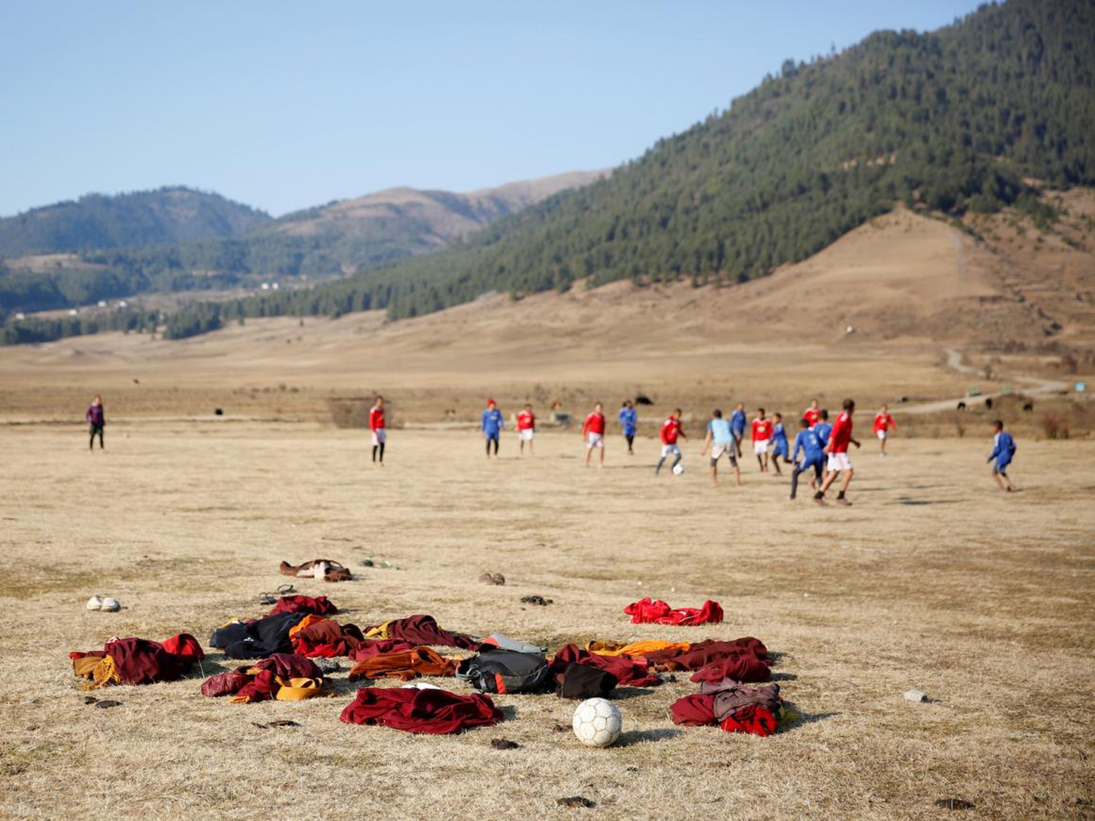 Every day, monks in the Phobjikha Valley take off their crimson robes in favor of Manchester United and Chelsea jerseys to play a game of soccer.