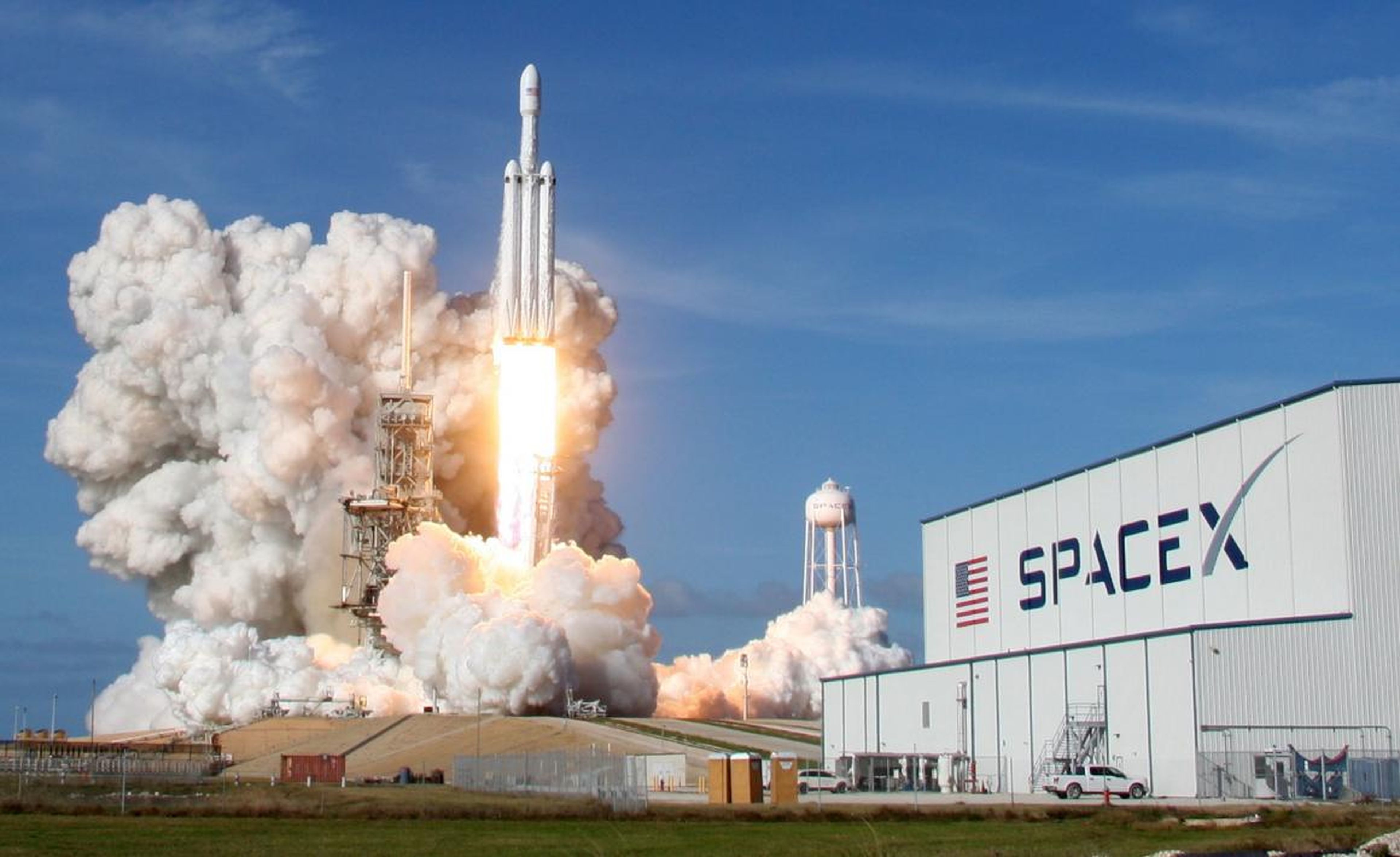 SpaceX's 23-story-tall Falcon Heavy rocket thunders toward space during its first launch in February 2018.