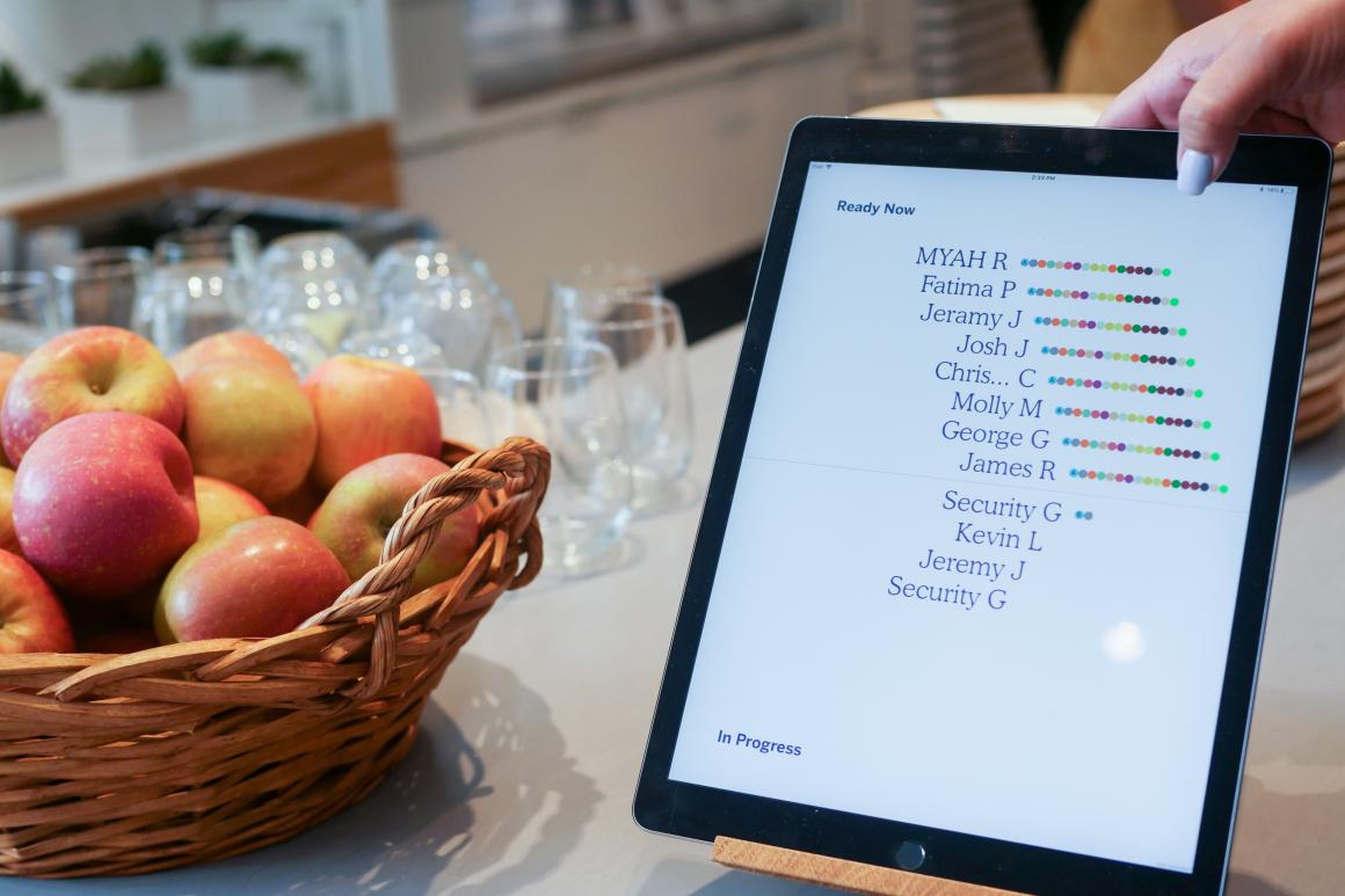Guests can monitor their order on this tablet. The colored dots represent each stage in the robot's preparation process.