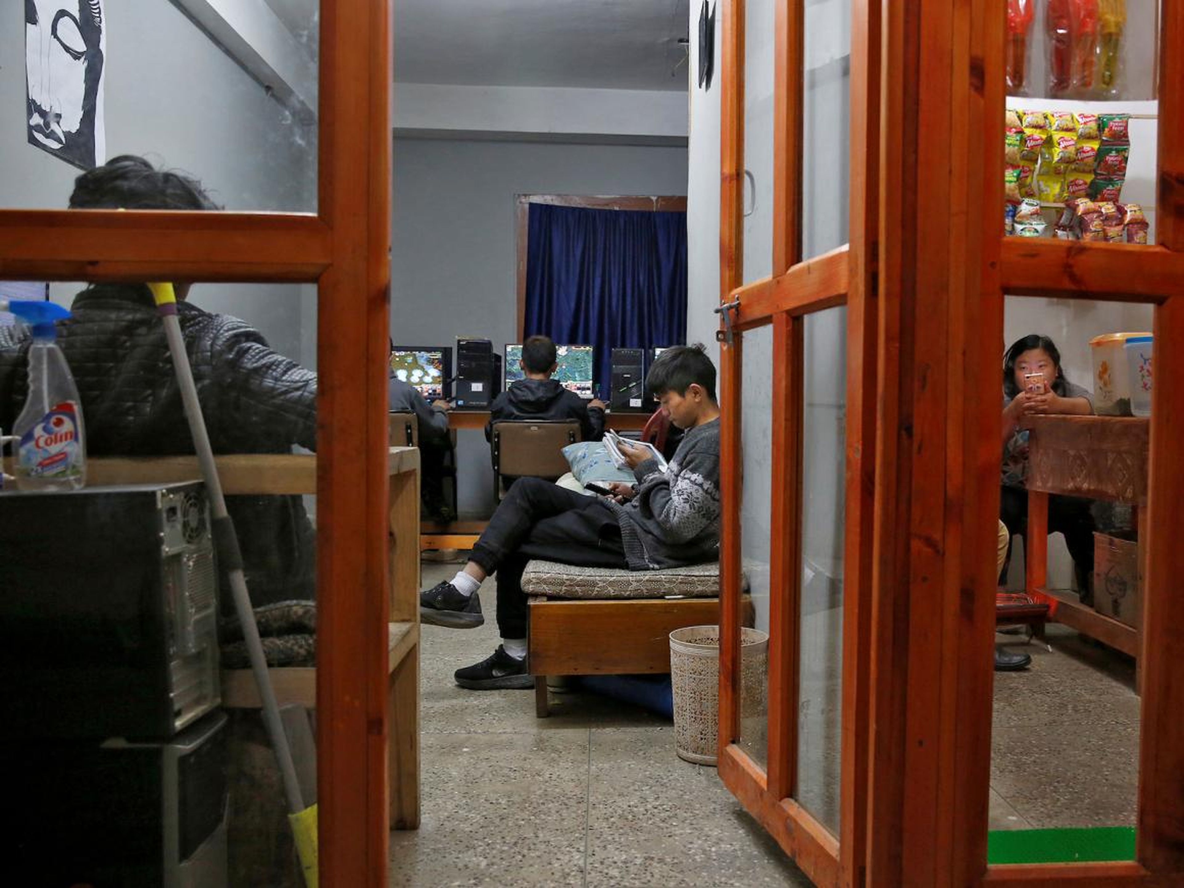 Internet cafes are filled with teenagers and young adults looking for something to do.