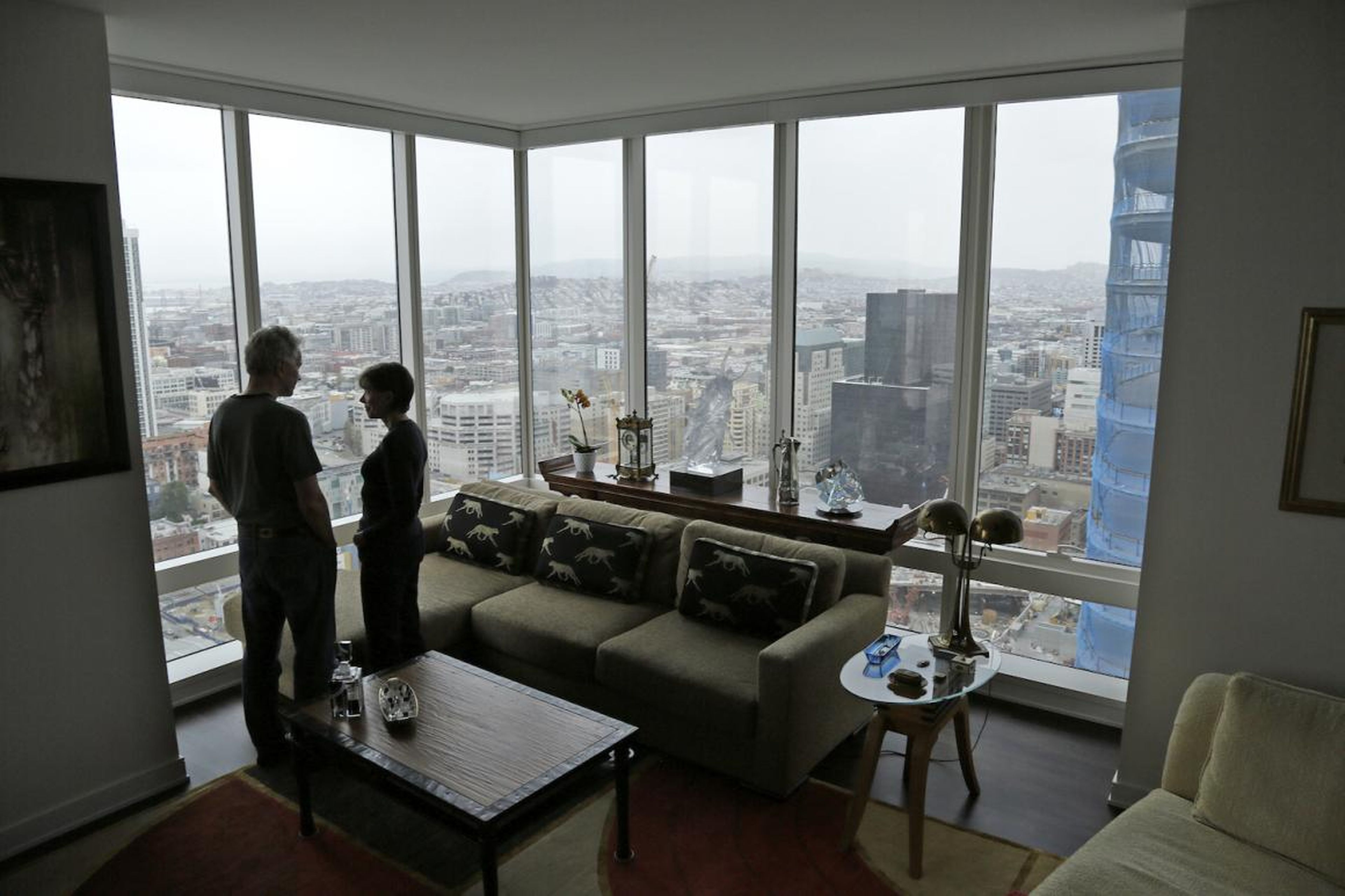 Jerry Dodson and his wife, Pat, inside their home on the 42nd floor of Millennium Tower.