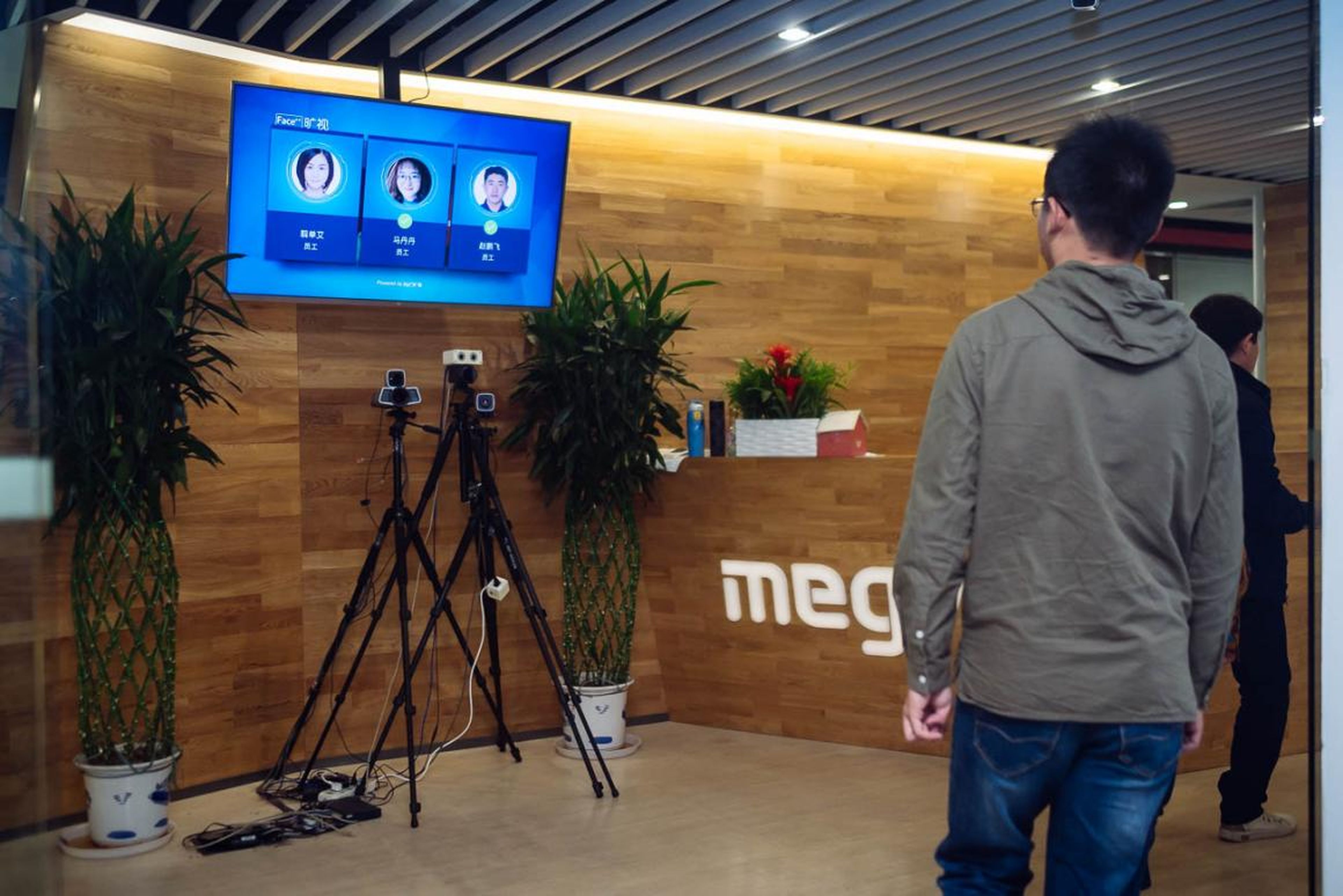 The system can handle multiple faces at once. As employees returned from lunch, each of their faces popped up on the screen. Currently, Face++ is being used in a number of industries in China, according to Xie Yinan, Megvii's vice