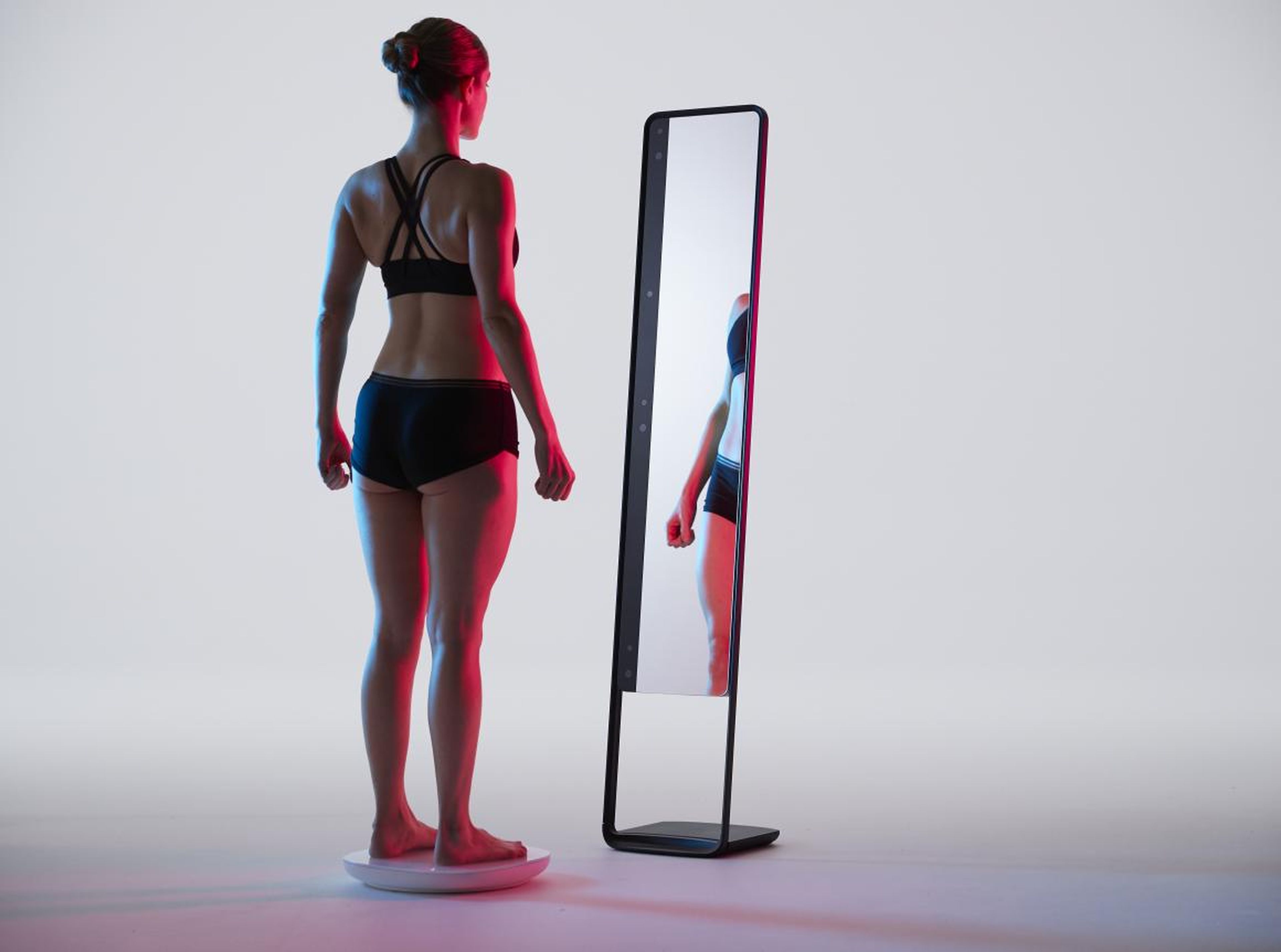 These entrepreneurs invented a futuristic 'magic mirror' to take on the bathroom scale — and investors say its groundbreaking tech could transform the future of fitness
