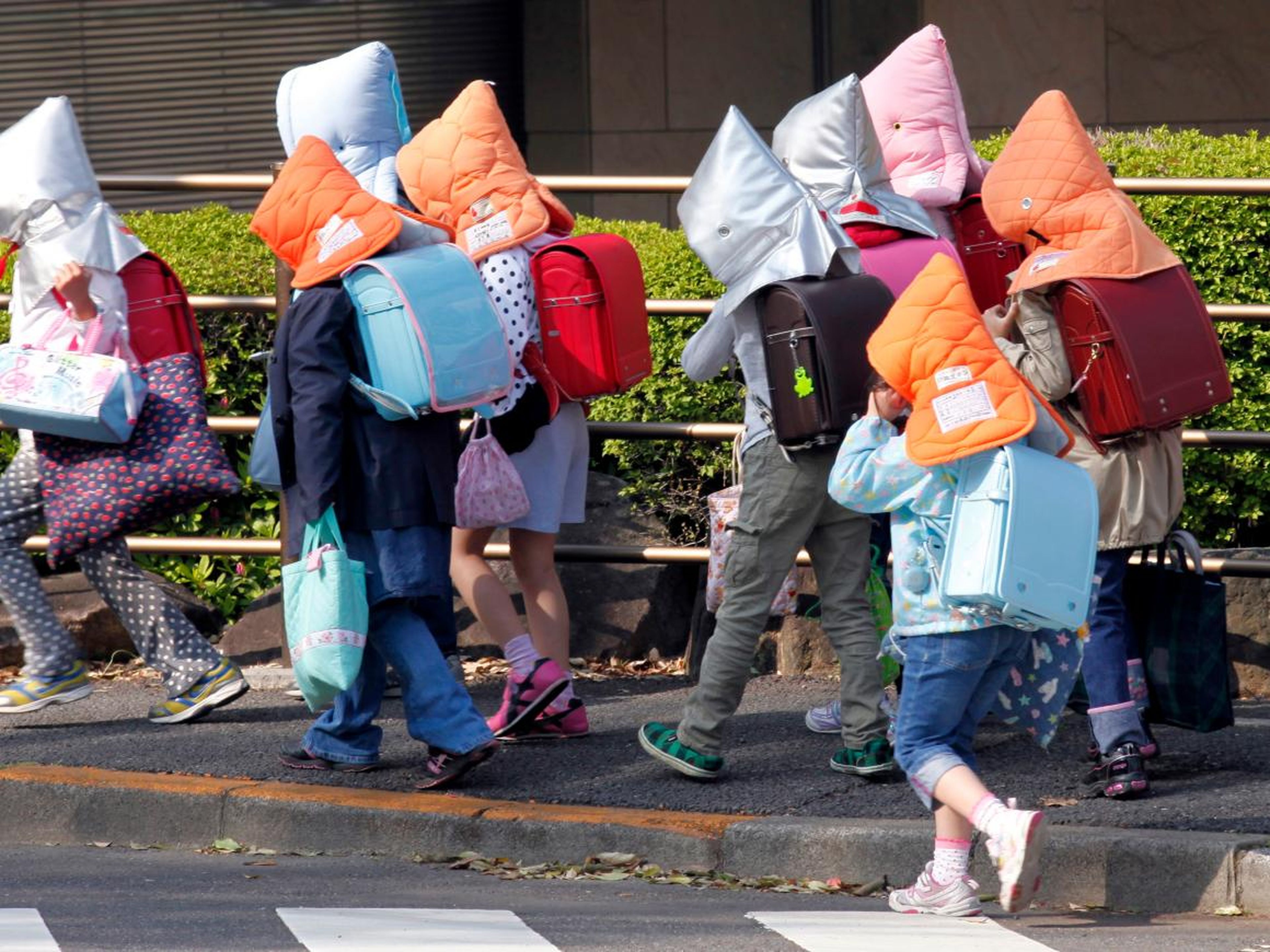 In earthquake- and tsunami-prone Tokyo, some schools ask parents to give their kids protective headgear in case a natural disaster strikes.
