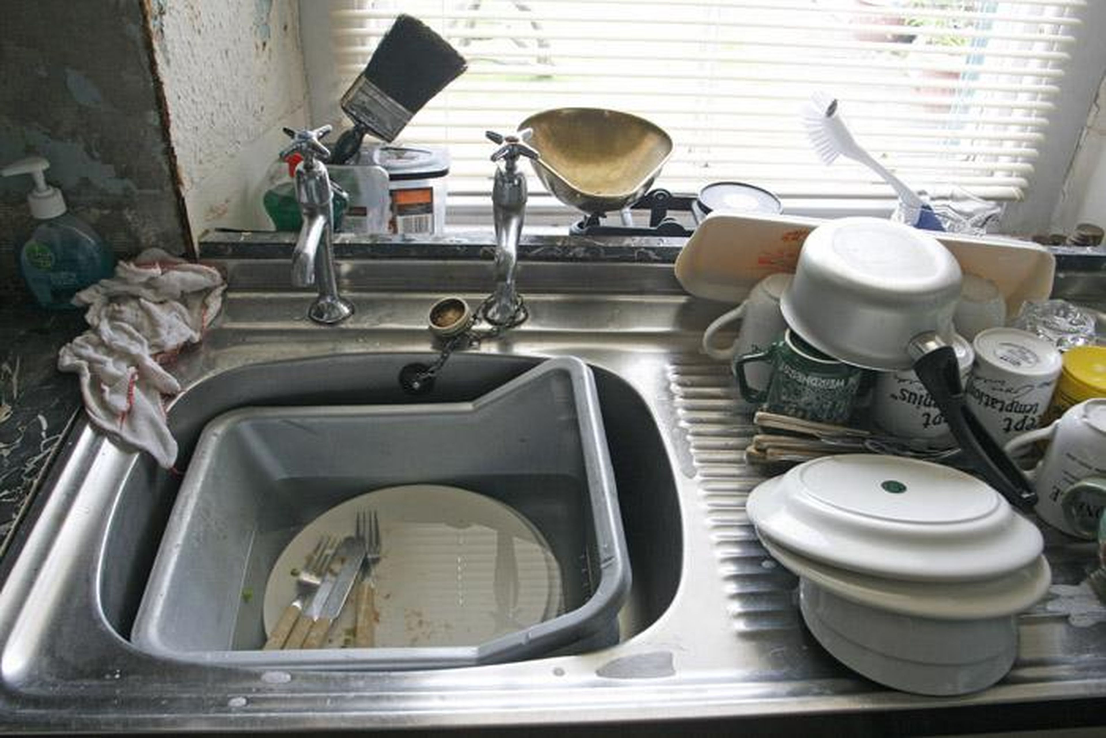 The kitchen sink is second only to the sponge when it comes to germs. Disinfect this basin once or twice per week, and immediately after you use it to handle raw meat.