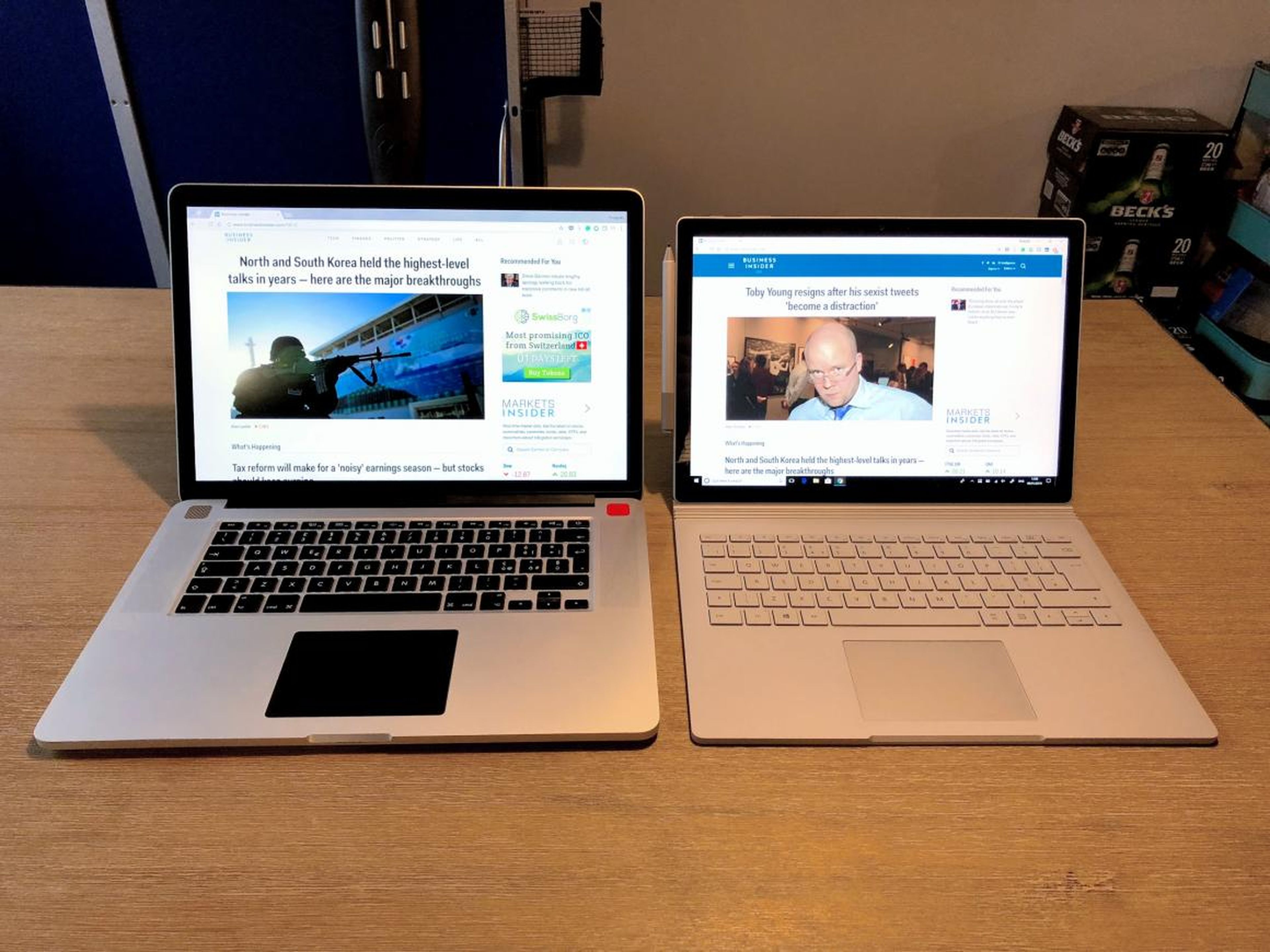 A 2013 MacBook Pro (left) and the 13.5-inch Surface Book 2 (right).