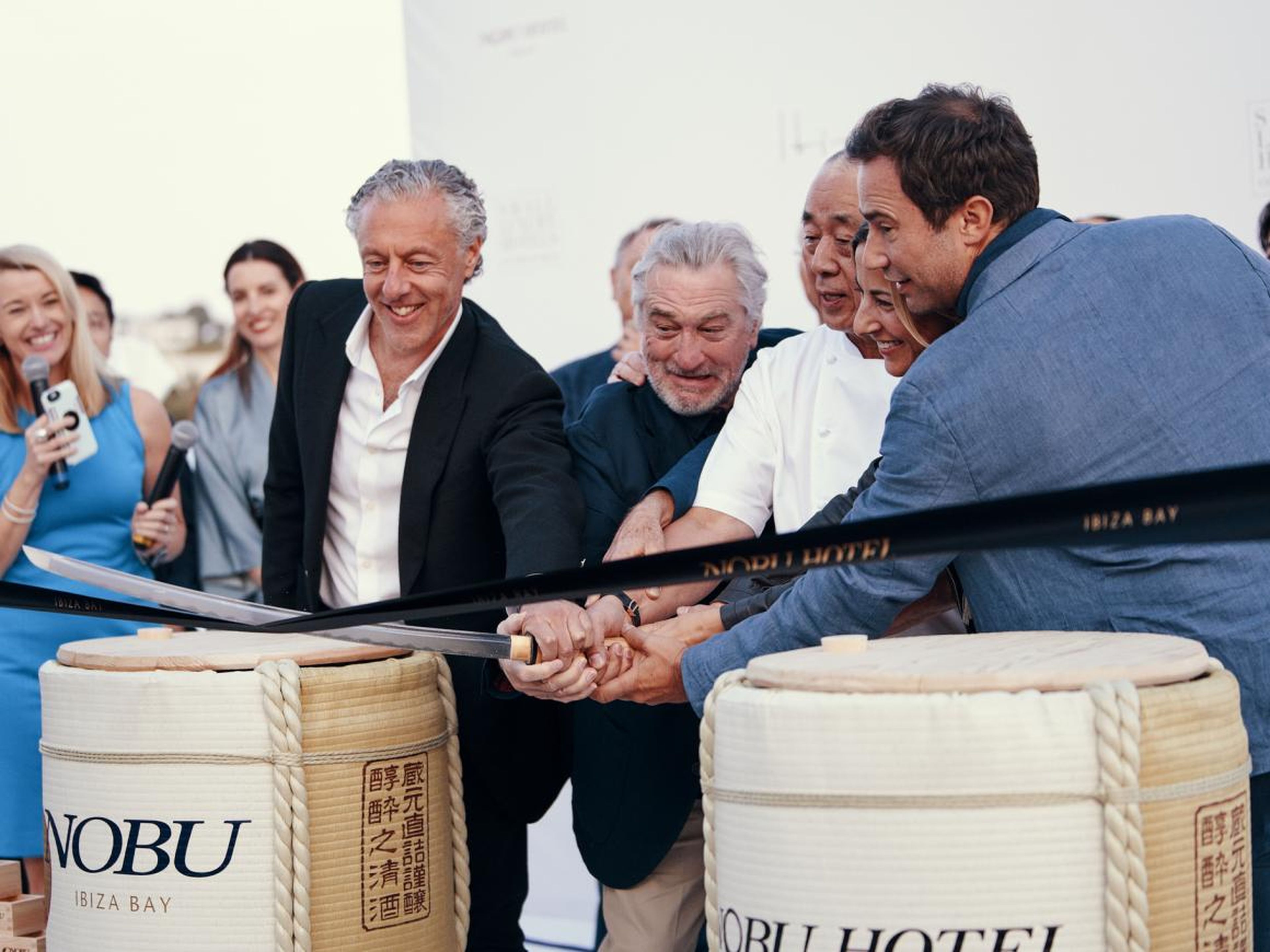 Actor Robert De Niro, Hollywood producer Meir Teper, and celebrity chef Nobuyuki Matsuhisa, co-founders of Nobu Hospitality, inaugurate the new Nobu Hotel Ibiza Bay this past May.