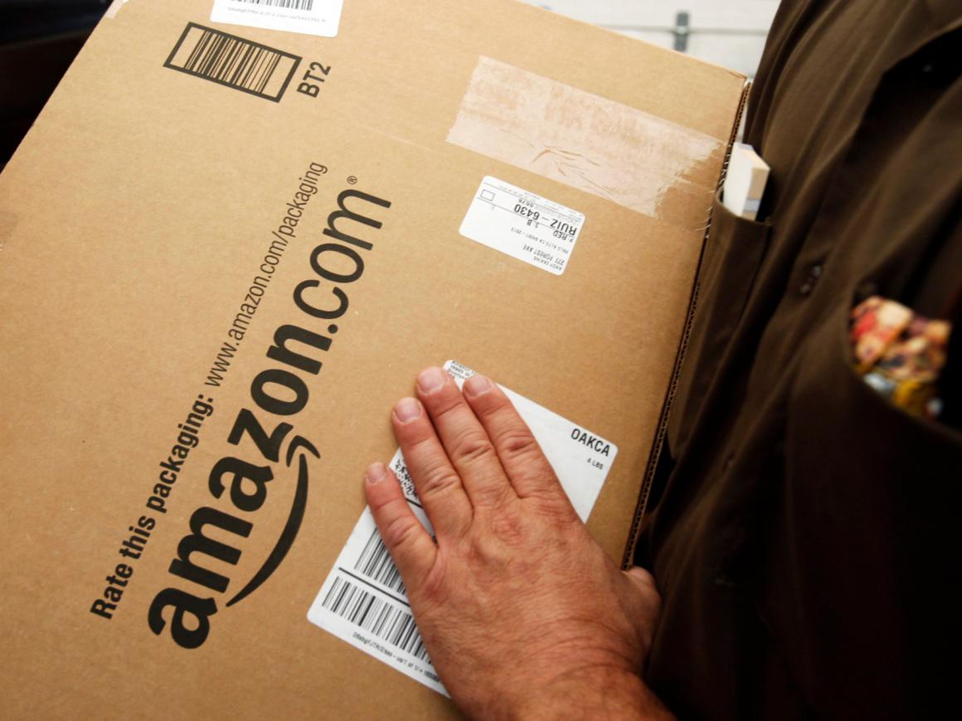 Amazon plants fake packages on delivery trucks, sources told Business Insider.