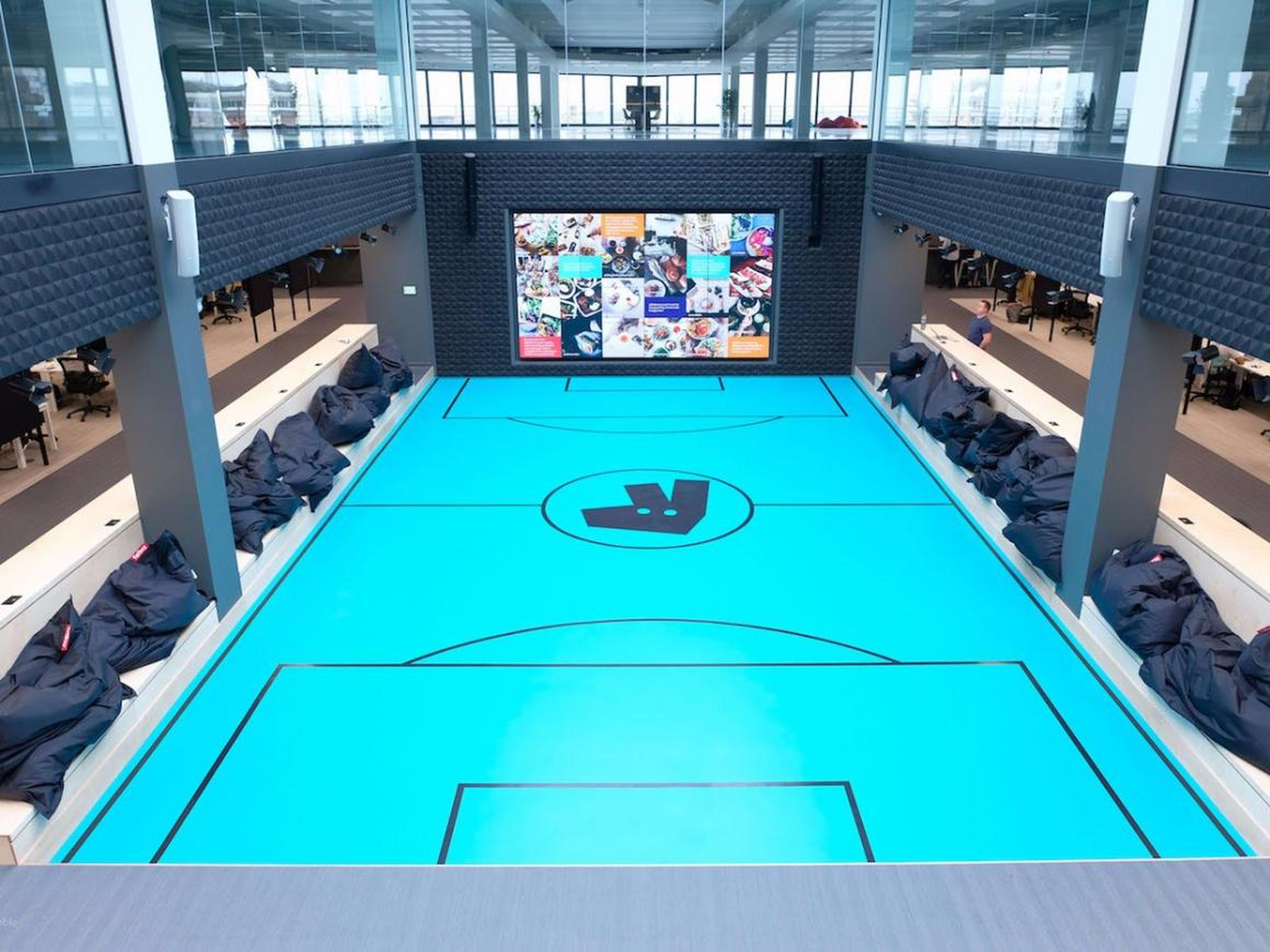 A centre court meeting space that used for large team meetings — but not for sports.