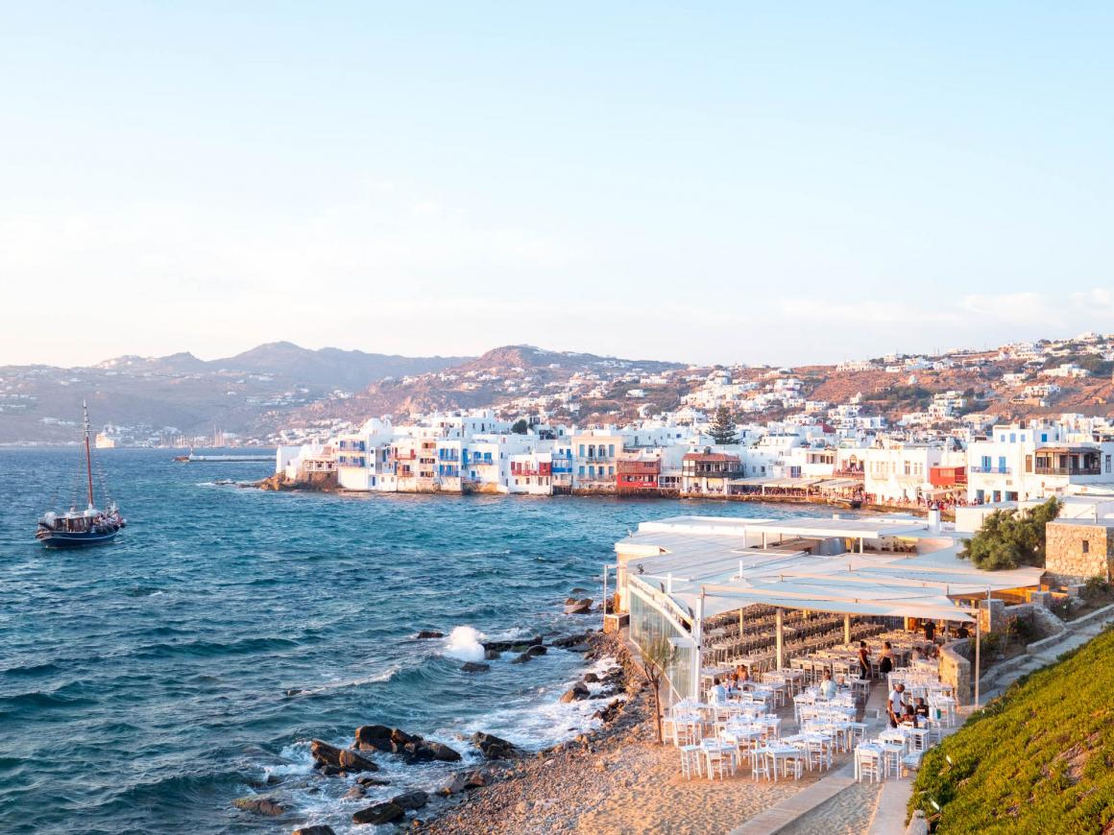 Measuring just 33 square miles in size, Mykonos is a sunny and cool Greek island stuffed with hip boutique hotels, thumping beach clubs, haute couture shops, white sandy beaches, whitewashed alleyways, and swanky restaurants.