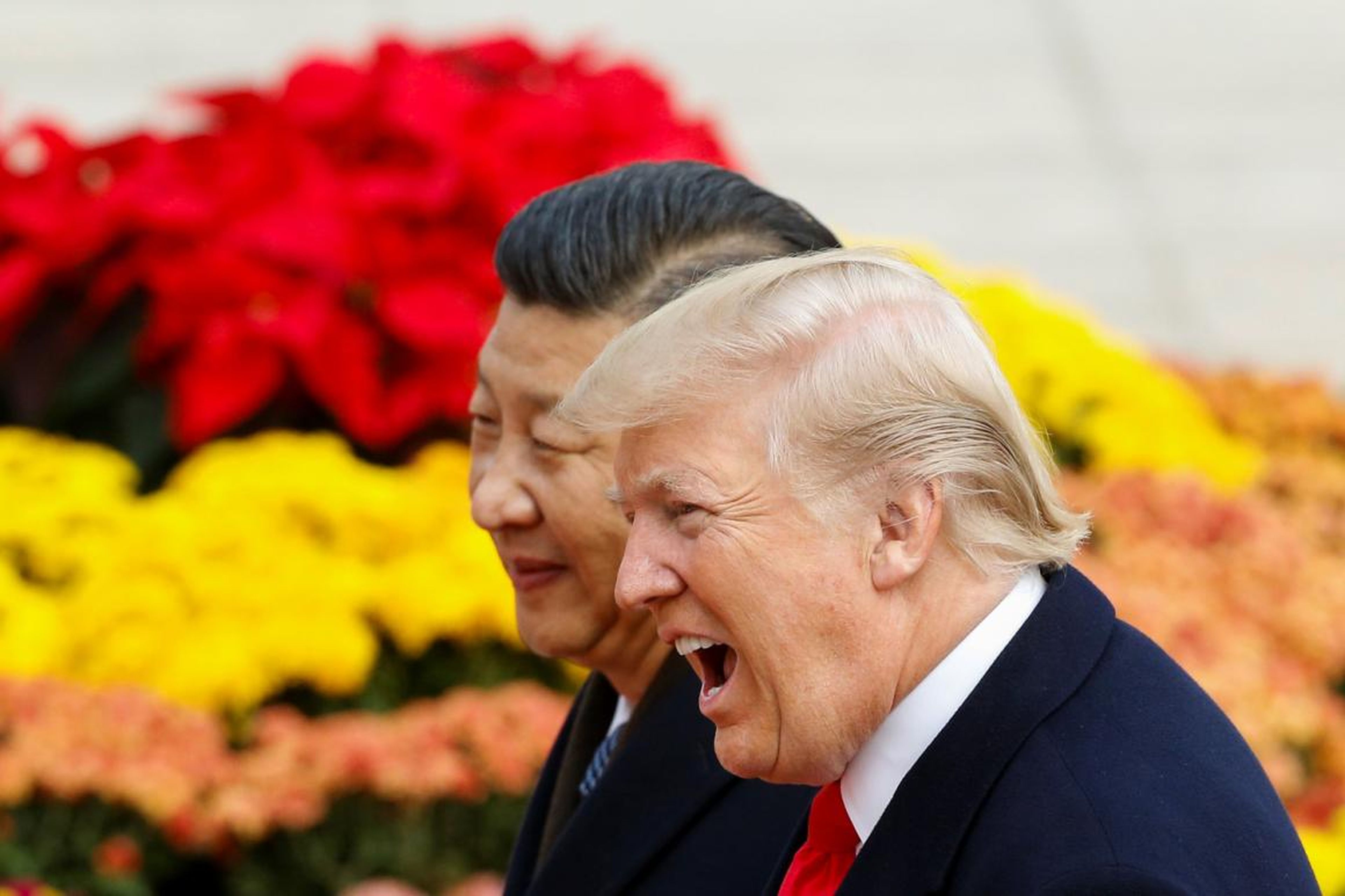 President Trump takes part in a welcoming ceremony with China's President Xi Jinping in Beijing.