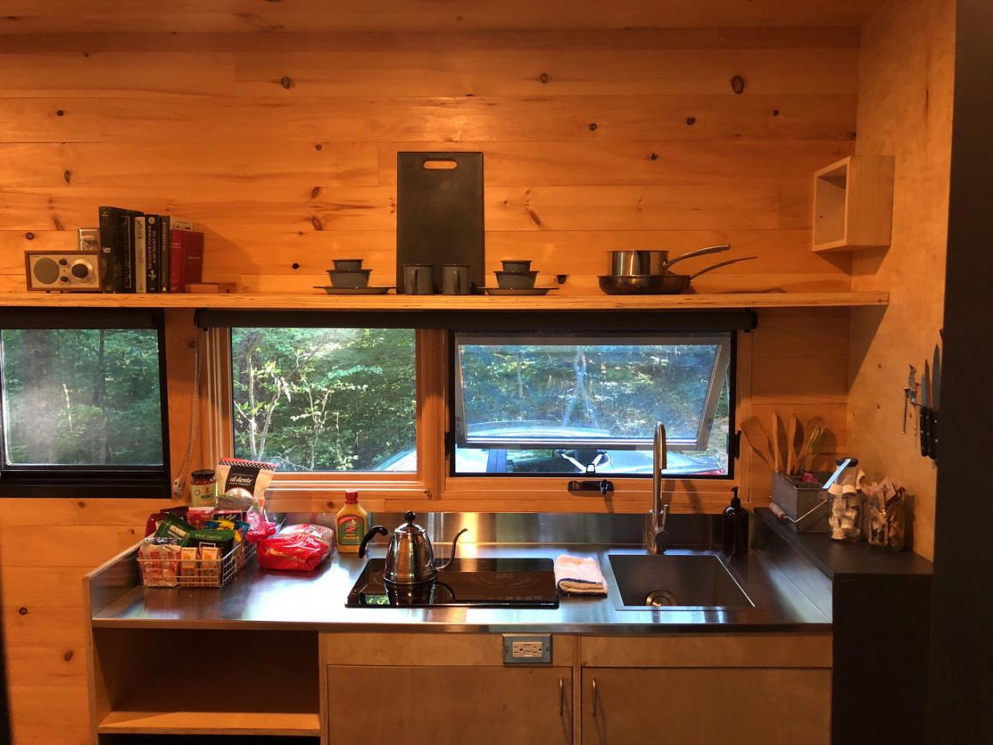 A tiny house means you'll no longer have a full kitchen — a mini fridge and lack of counter space can be a problem if you like to cook. "I see tiny houses with mini-fridges and a two-burner stove top with no oven," Justin, a Tiny