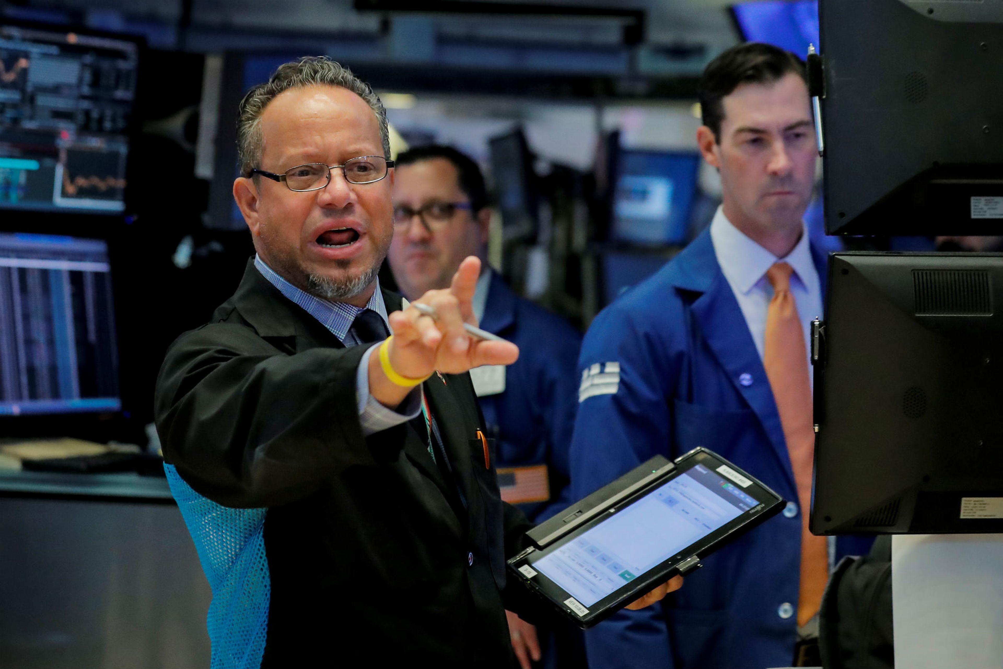 Traders en el parqué de Wall Street.
