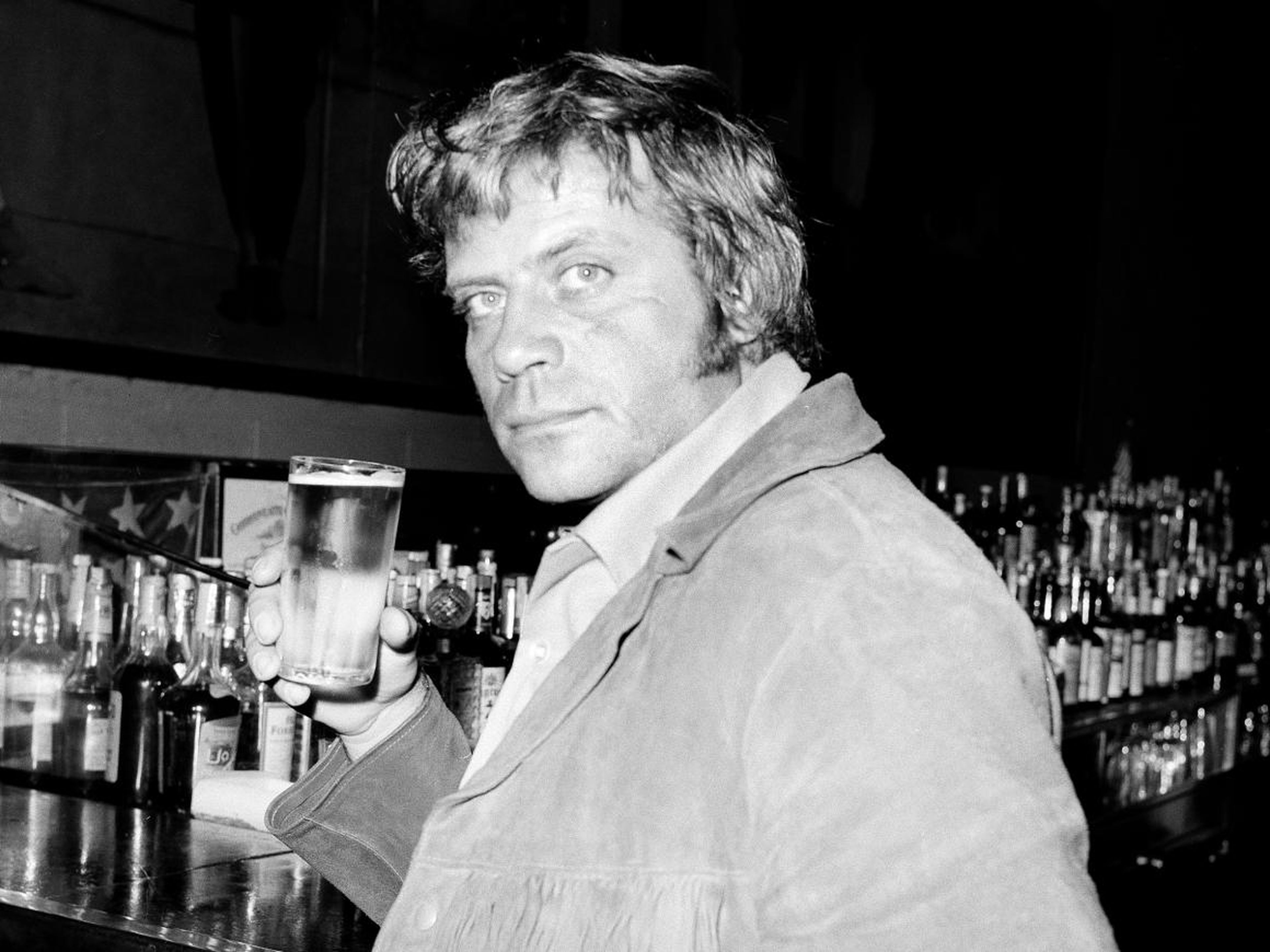 British film star Oliver Reed is seen in the bar at the St. Regis Hotel in New York in 1970.