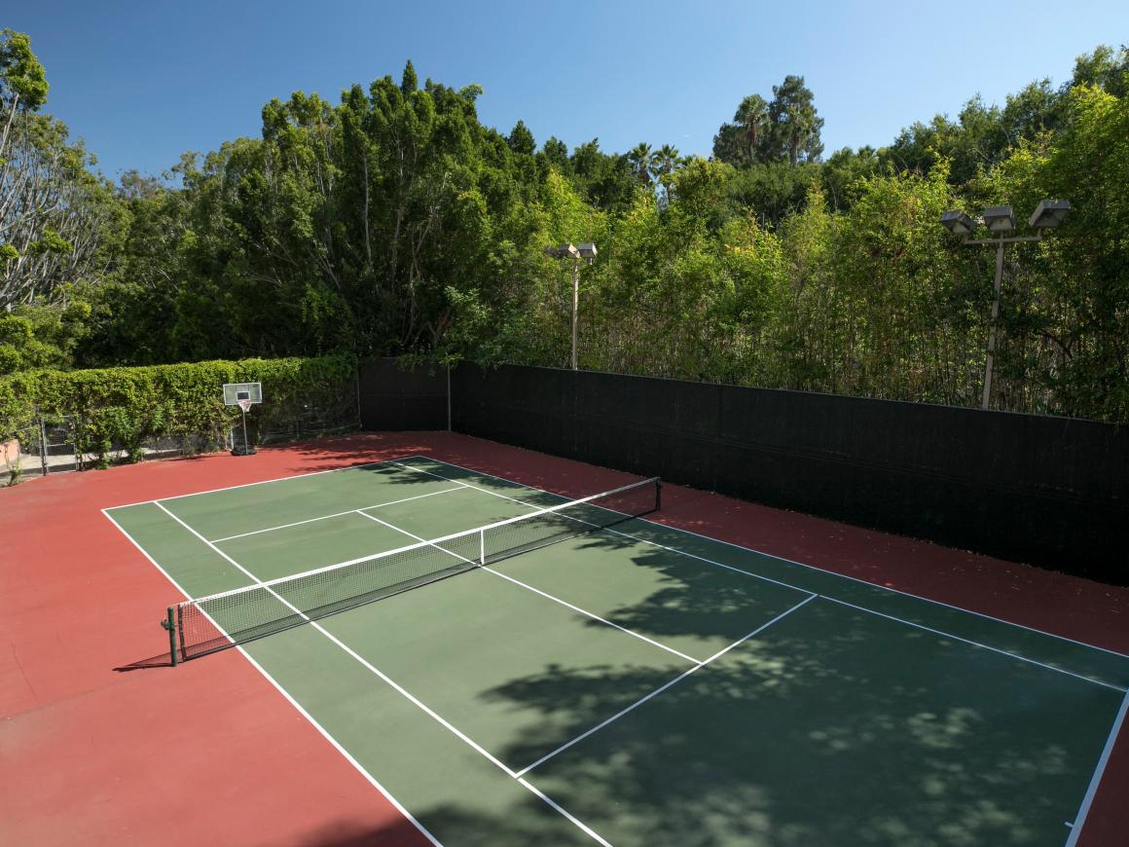 And what would a multimillion-dollar estate be without its own private tennis court?