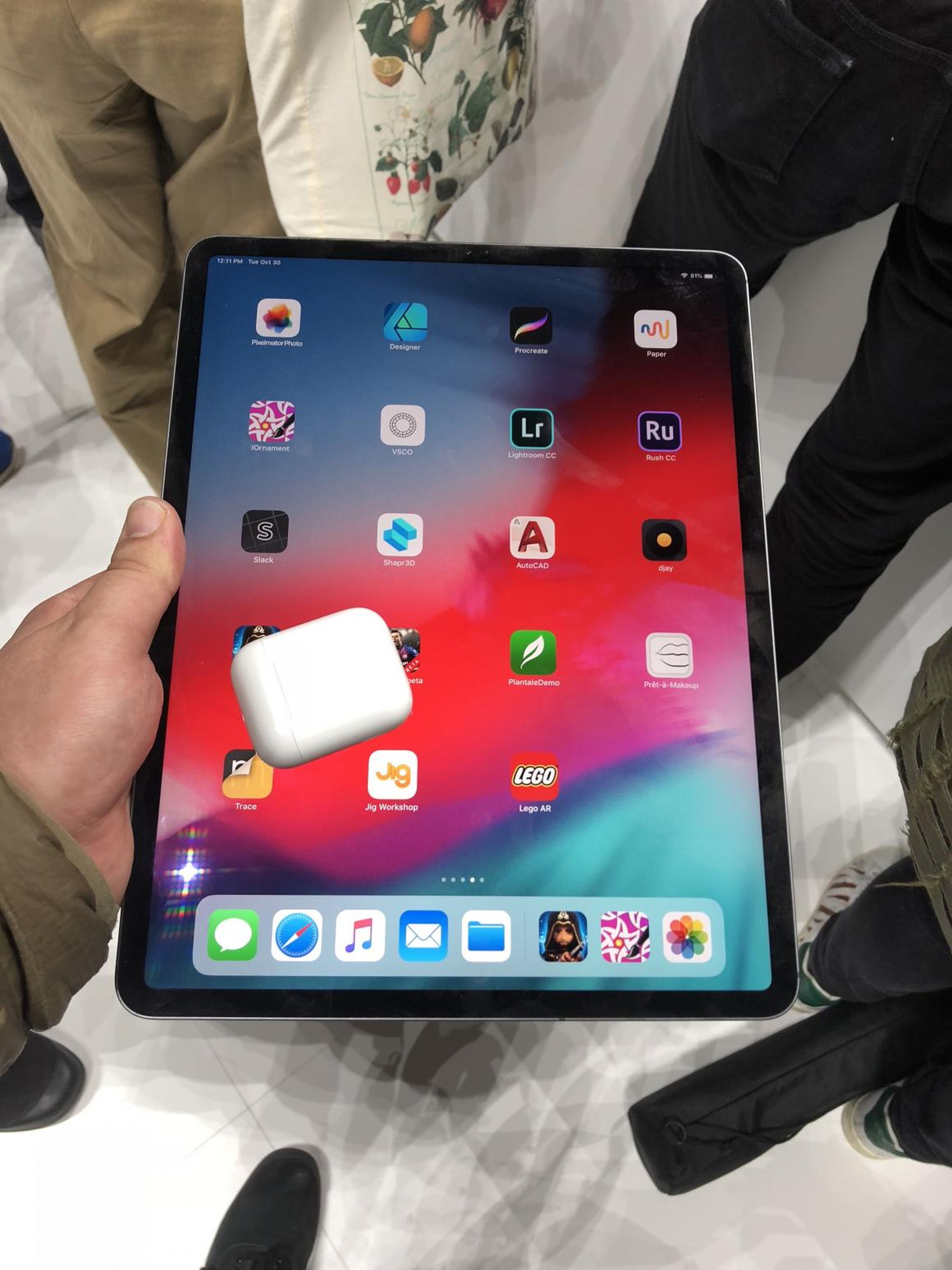 The bigger iPad Pro is probably too big to use comfortably as a tablet — it's geared toward design professionals and those that really need a big screen. Here it is with AirPods for scale.