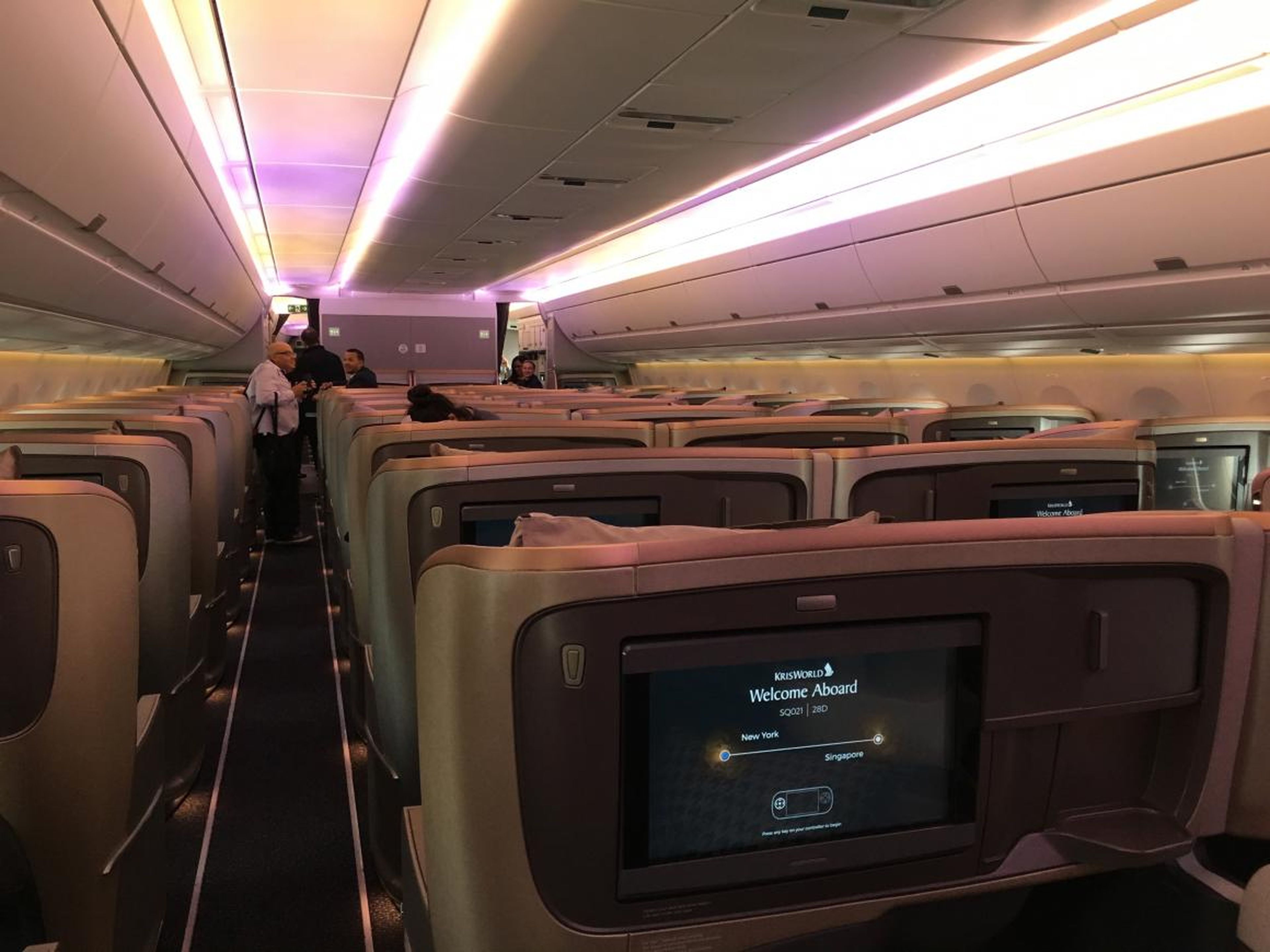 On board, I made my way through the business-class cabin to my seat. Our plane had only 161 seats, with 67 in business ...