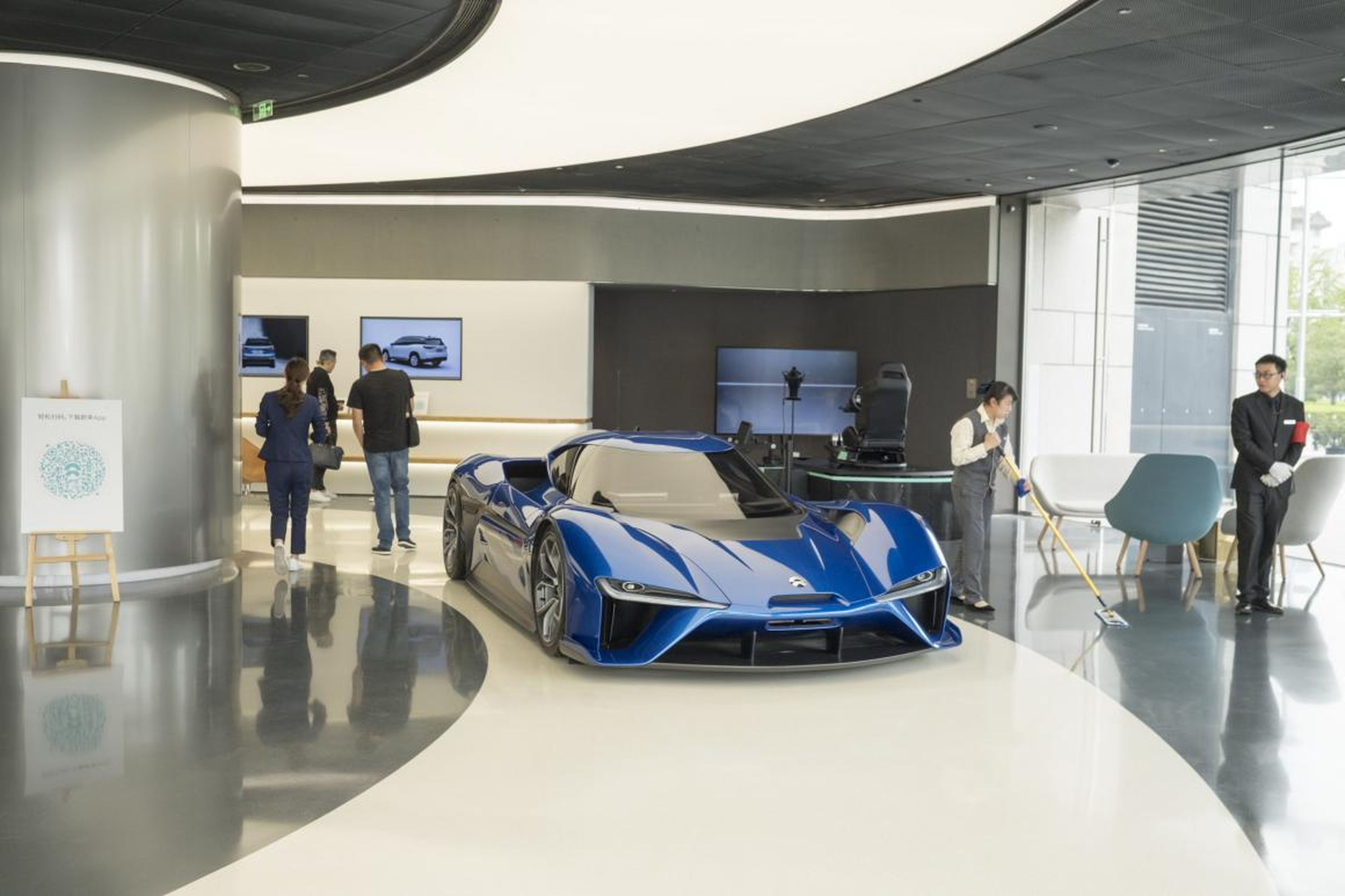 The bottom floor of the Nio House looks like a pared-down car showroom. While the company's ES8 is available to look at, the showstopper is Nio's EP9 supercar, which it says set the record for fastest lap by an electric car at two