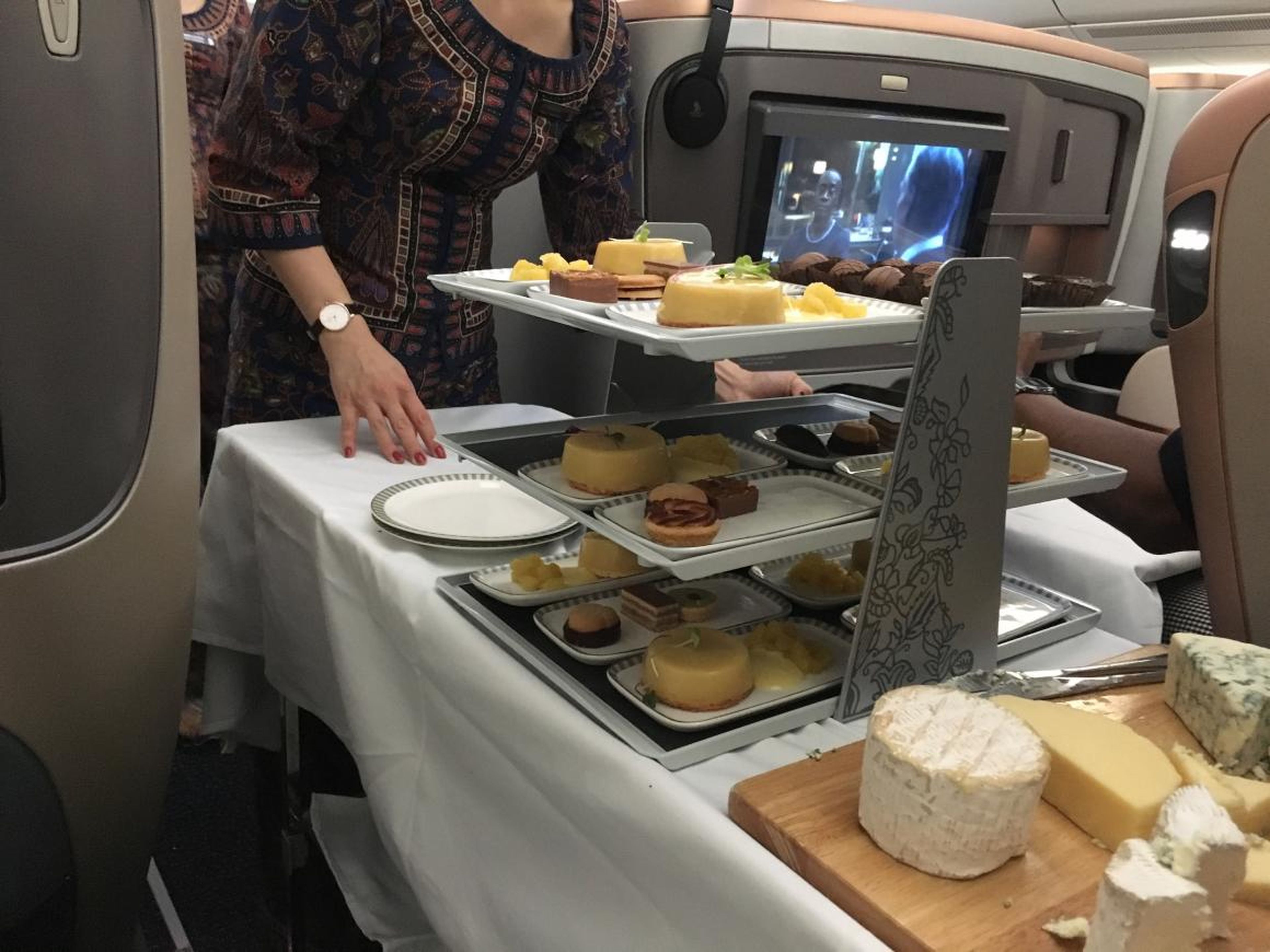 Flight attendants also came by each seat with a cart of cheeses, fruits, and desserts.