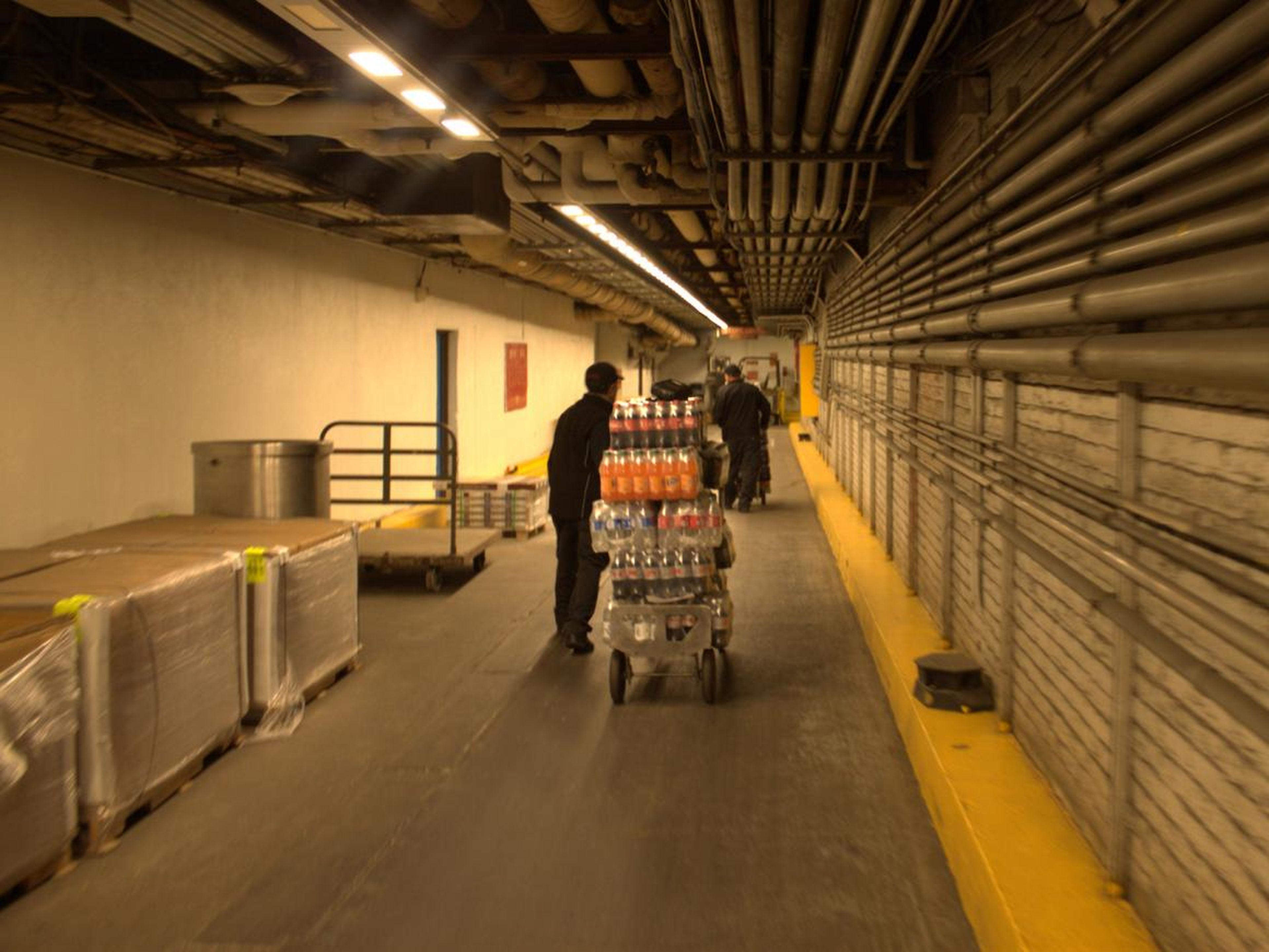 Louis and Santiago deftly moved the thousands of bottles through the storage area and into the part of Penn Station I'm more familiar with.