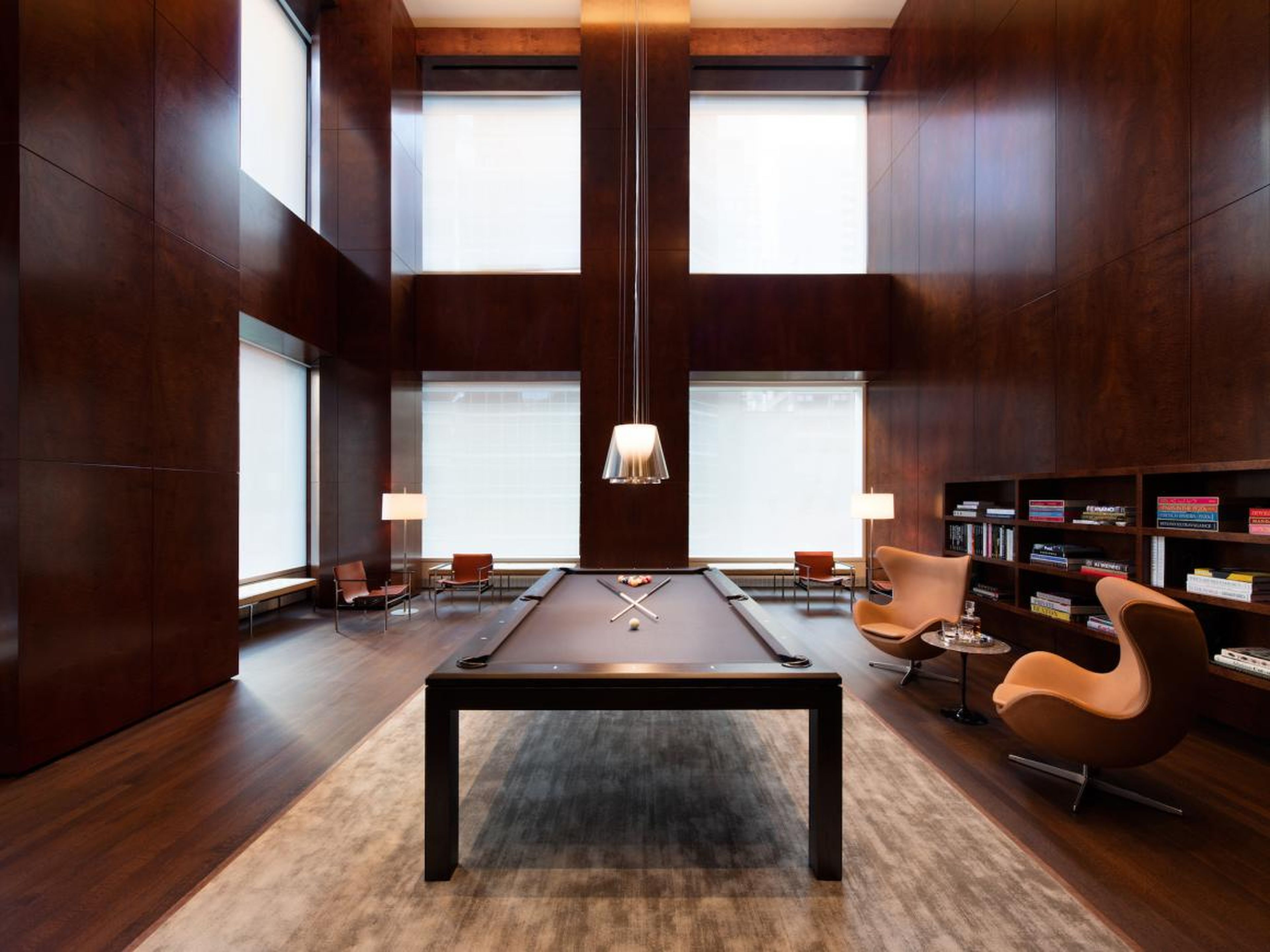Other amenities at 432 Park include a billiards room and a library ...