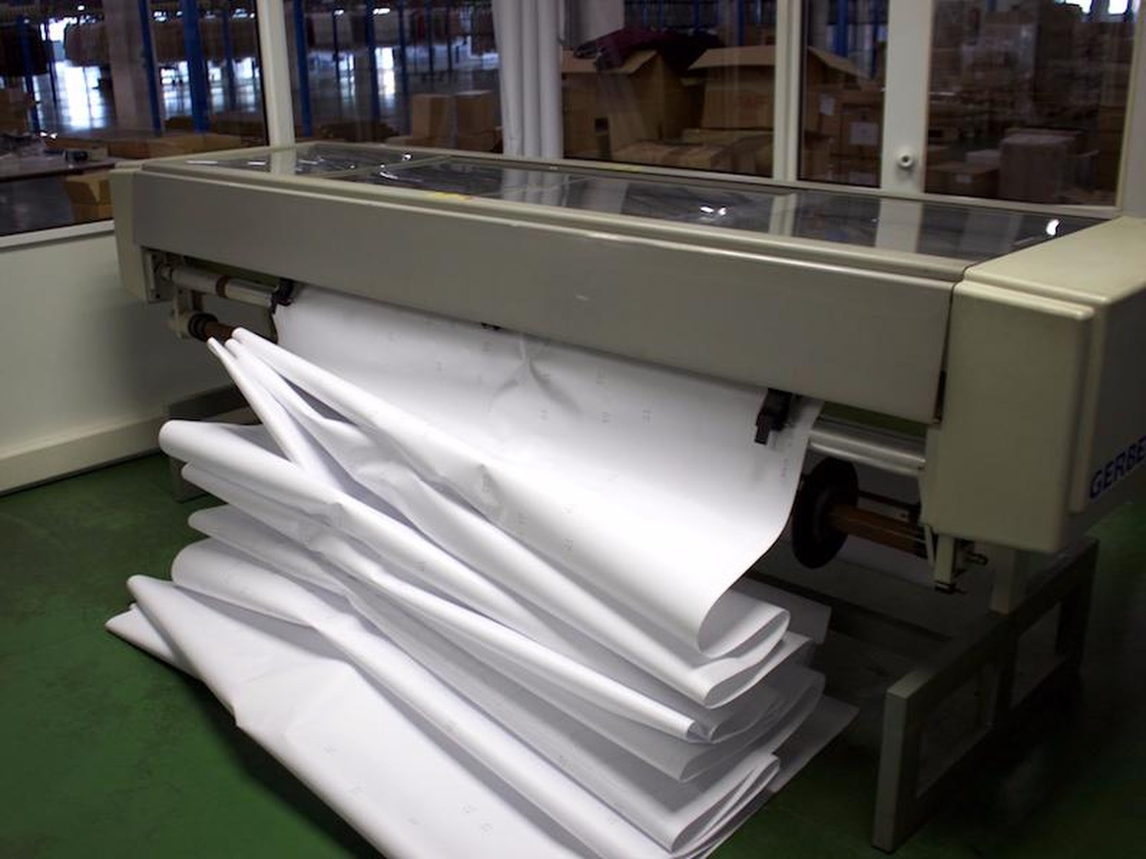The pattern layout is then sent to a machine that prints a life-size copy, using the relevant information about what part of the garment each piece is.