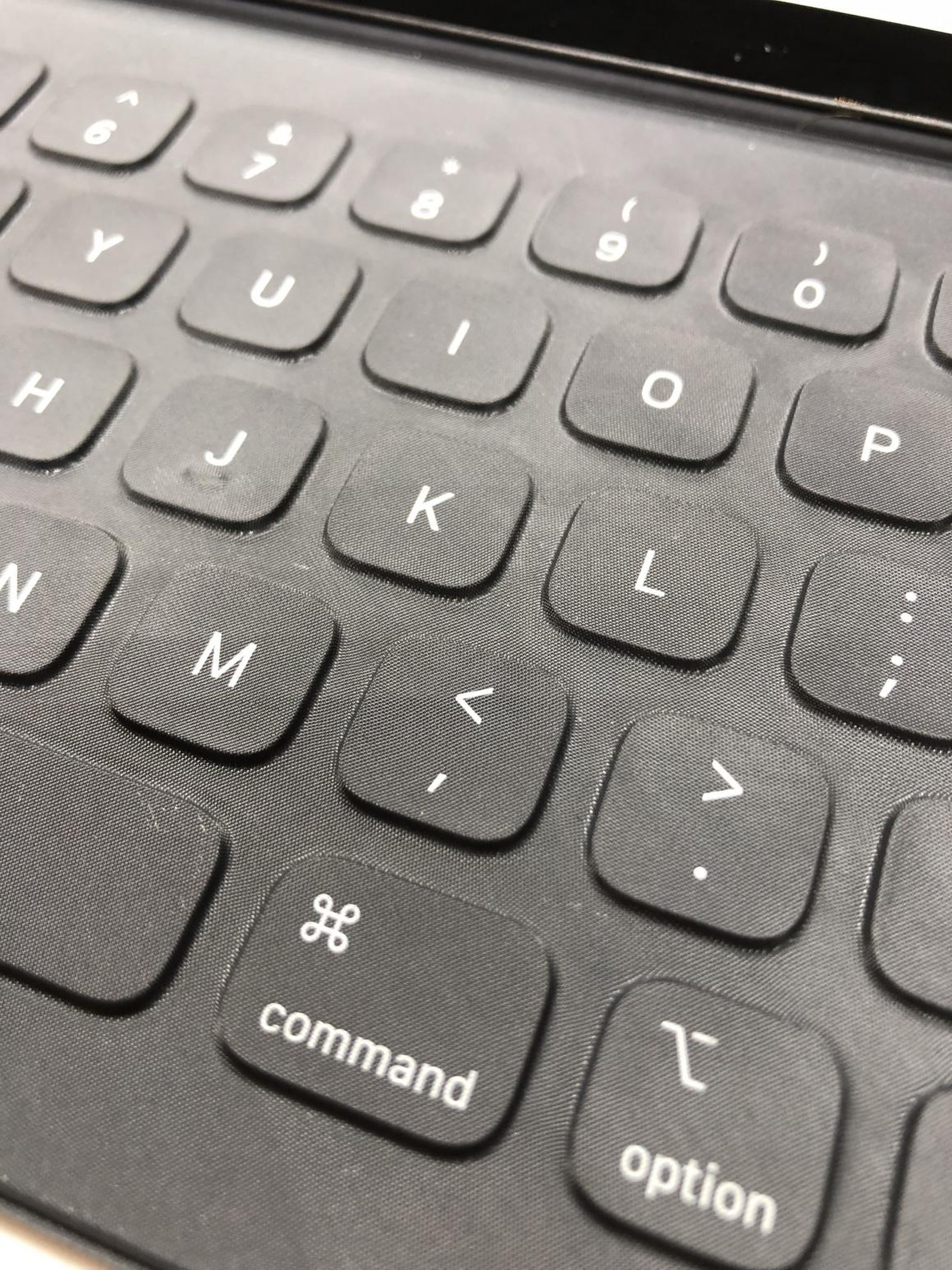 See how deep these keys are? They're also covered with some kind of textured cloth. Only time will tell how well it holds up to daily use.