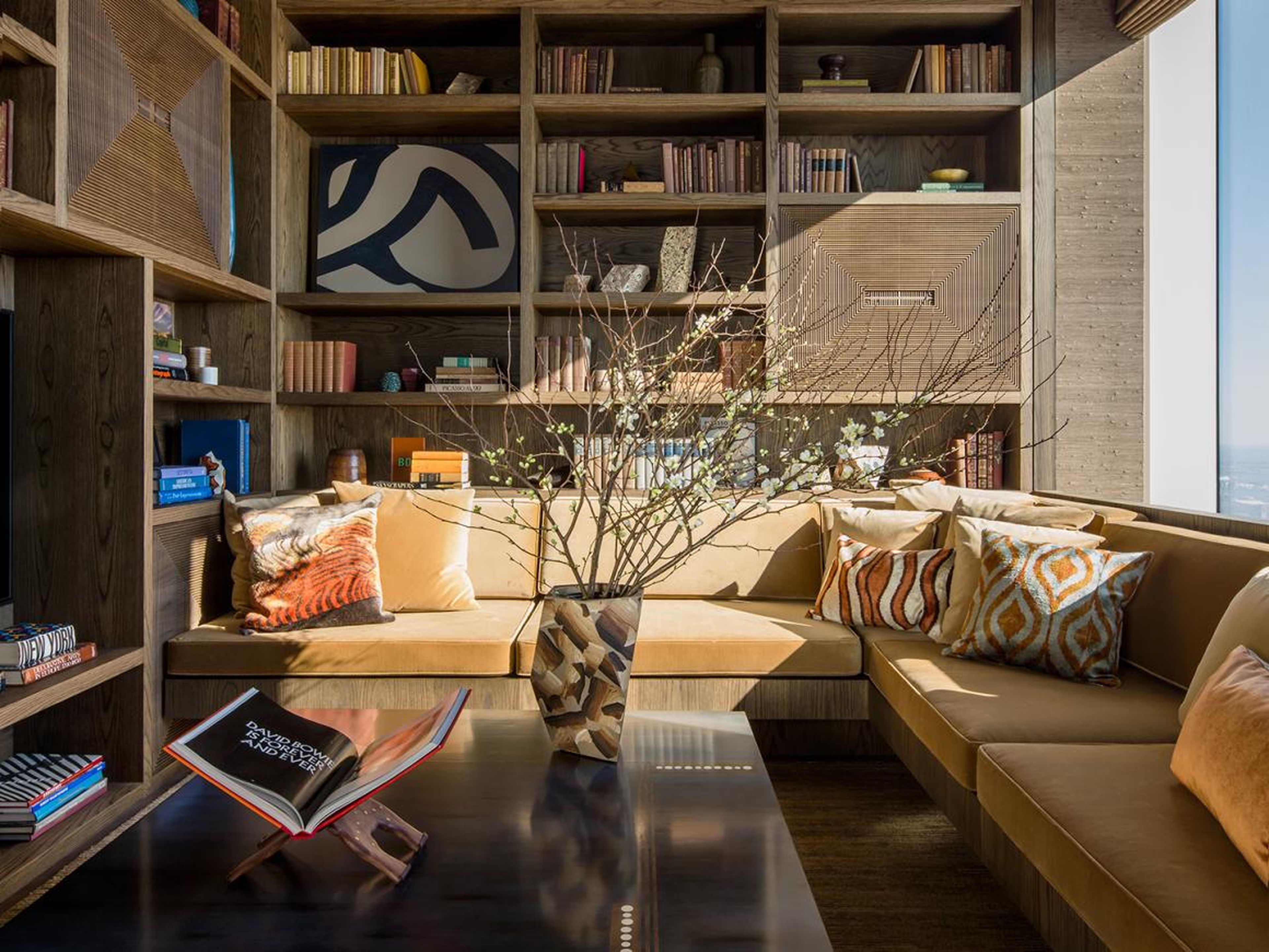 The full-floor penthouse included a separate library with a wood-burning fireplace.