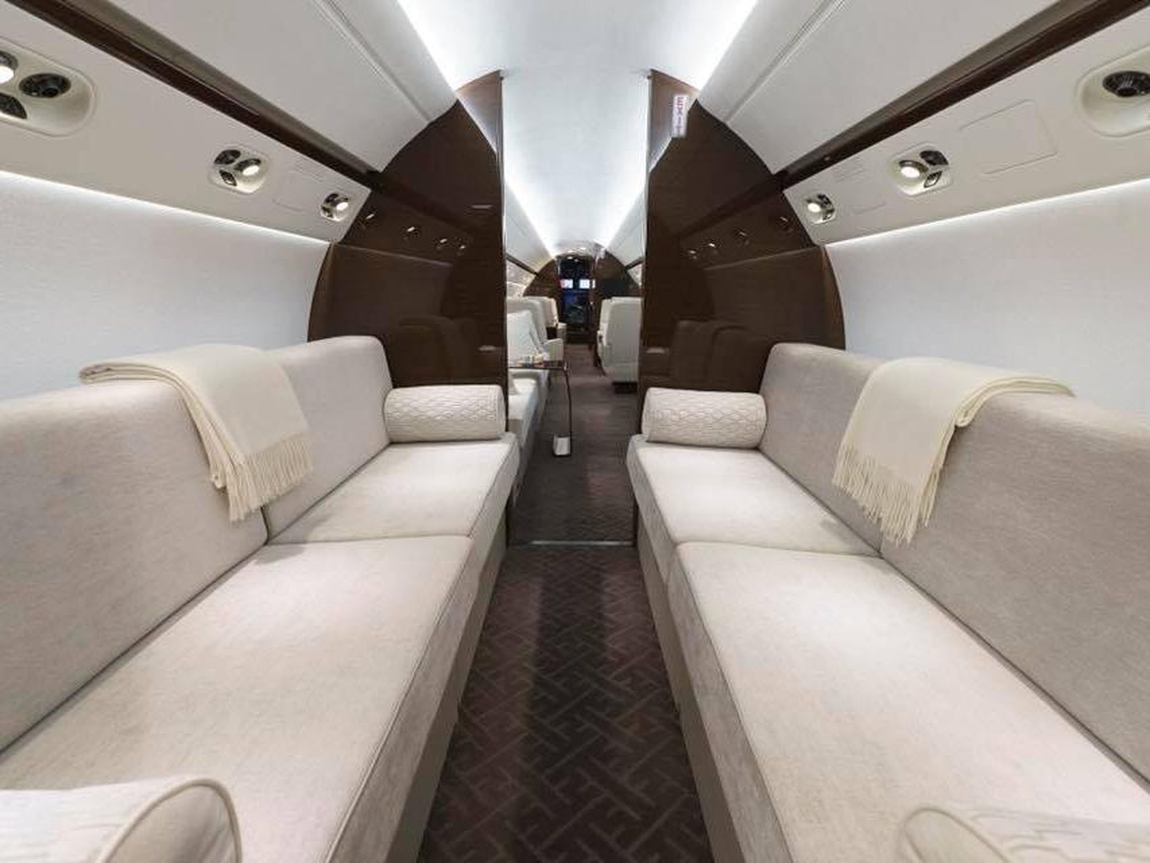 On some private planes, you can stretch out on a sofa instead of being squished between other passengers.