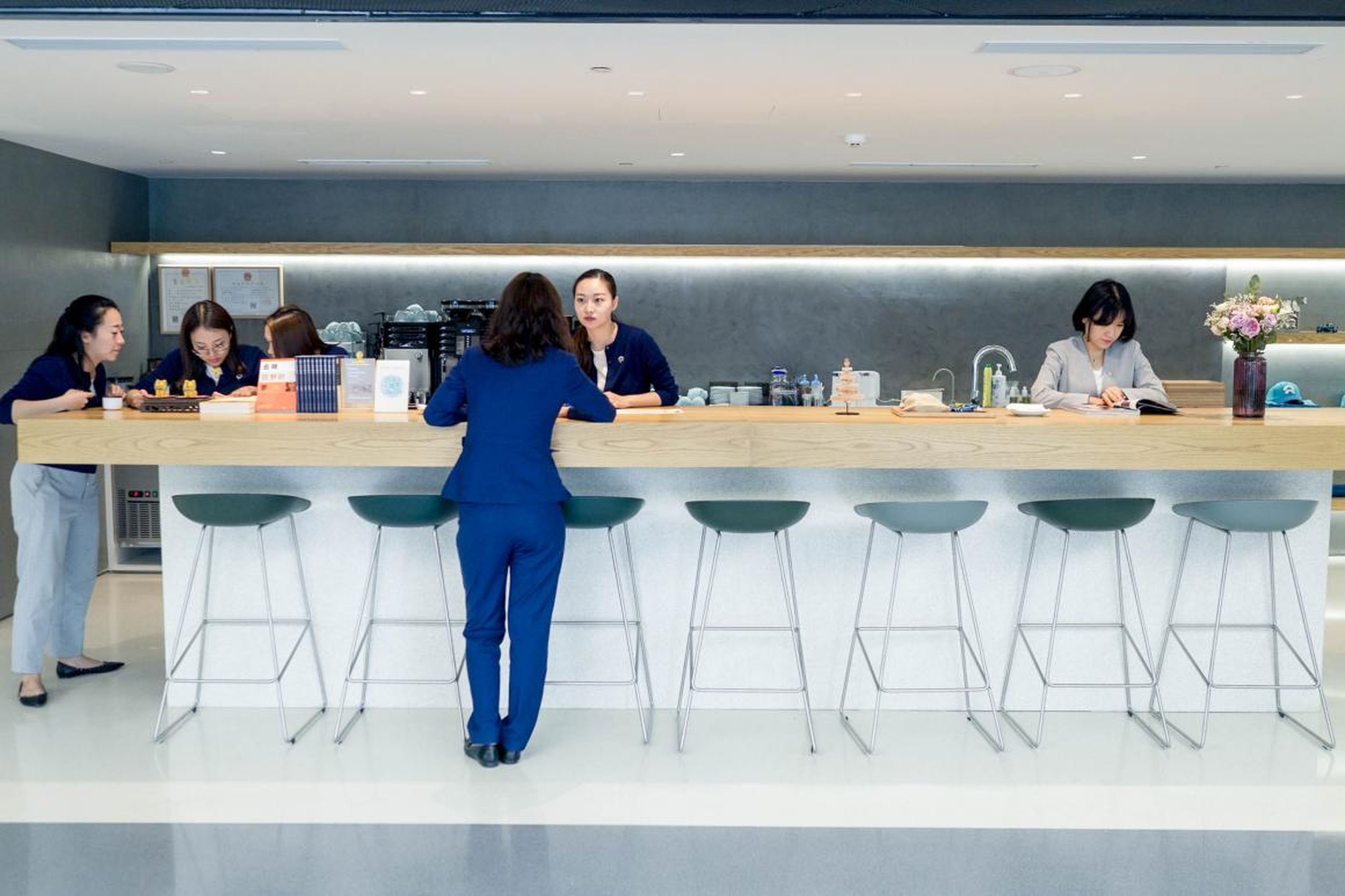 There's an open-plan kitchen where Nio's baristas serve up fresh coffee and snacks.
