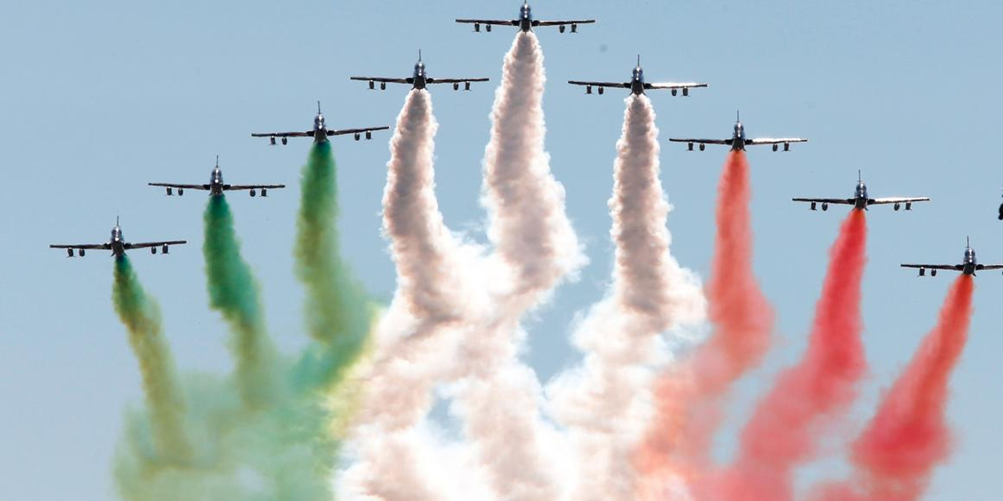 The Italian Freccie Tricolori aerobatics team perform prior the start of the Italian F1 Grand Prix in Monza, northern Italy
