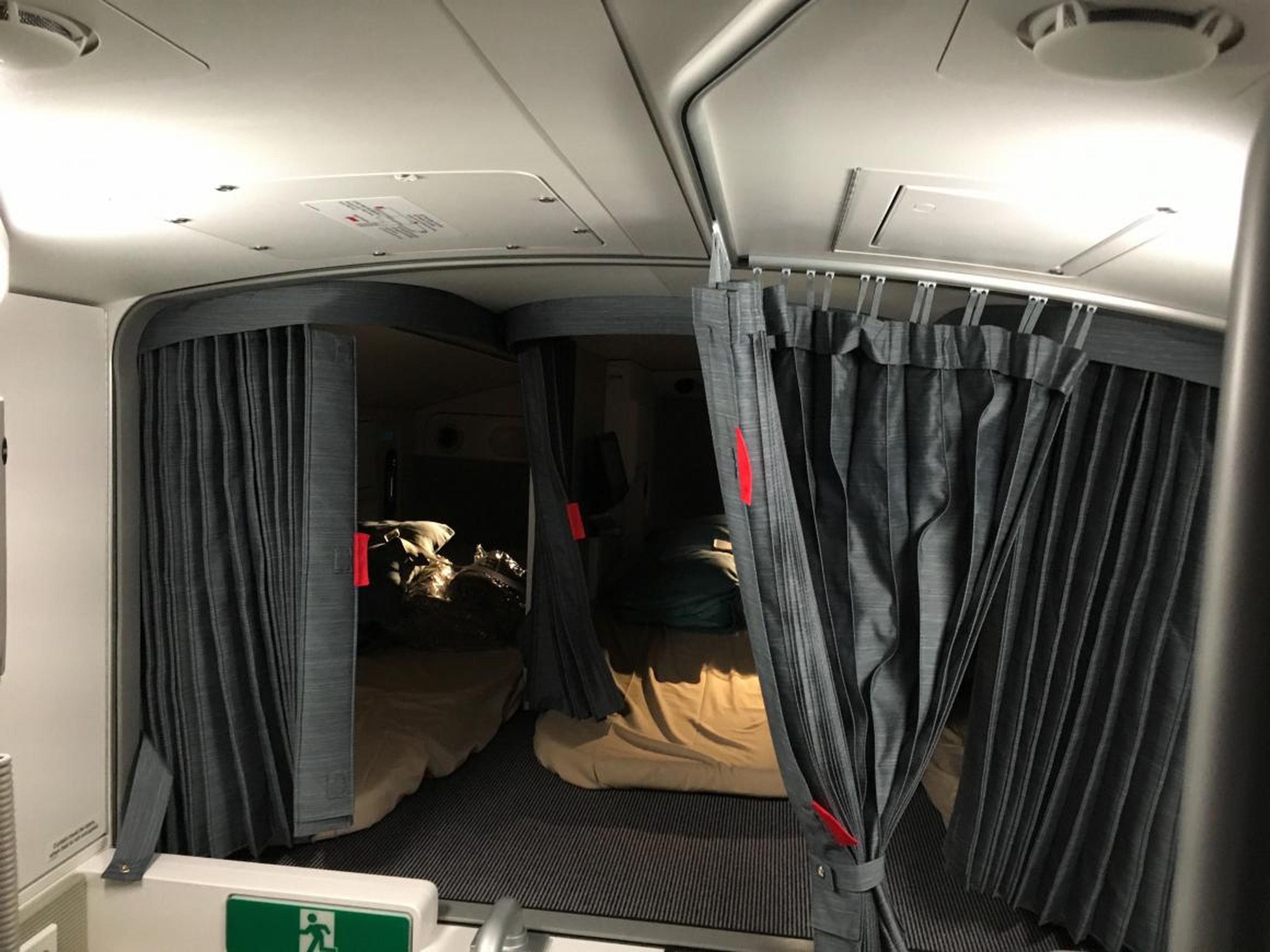 Tucked away above the rear passenger cabin is the cabin crew rest compartment.