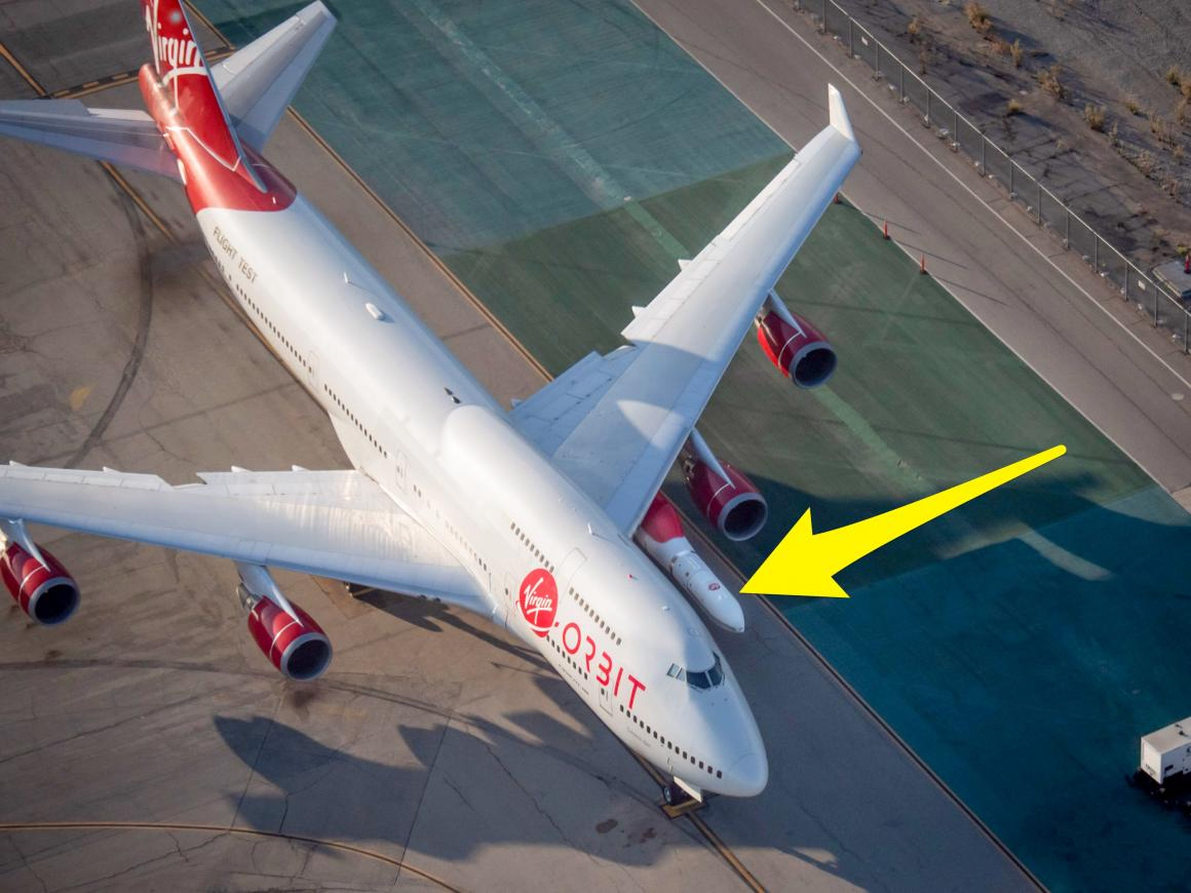 Virgin Orbit's modified "Cosmic Girl" jet airplane will soar the "Launcher One" orbital rocket to a mid-flight launch.