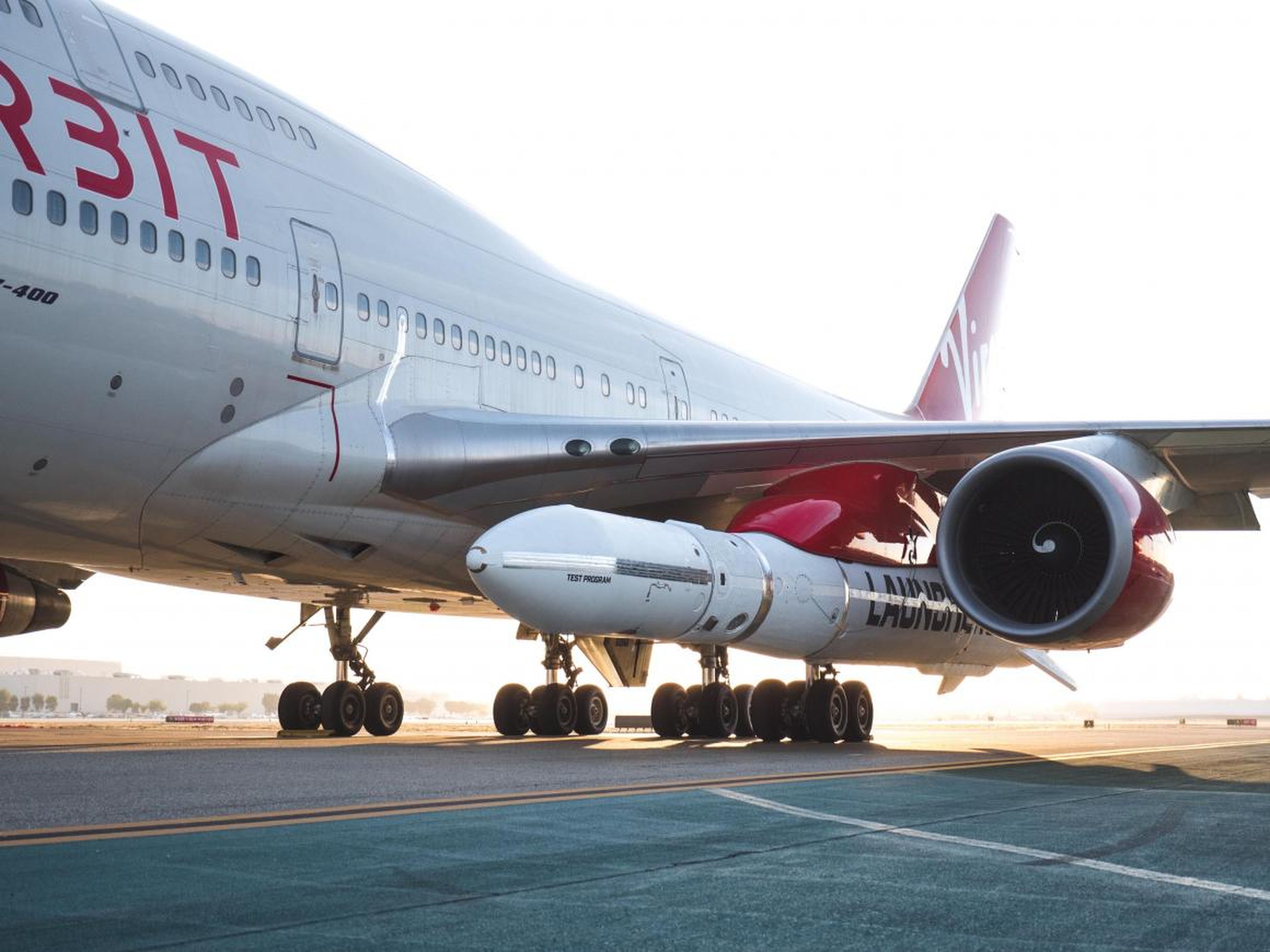 Virgin Orbit's next step is to pull off a series of "captive carry" flights, in which Cosmic Girl takes off and flies around with LauncherOne attached to its wing.
