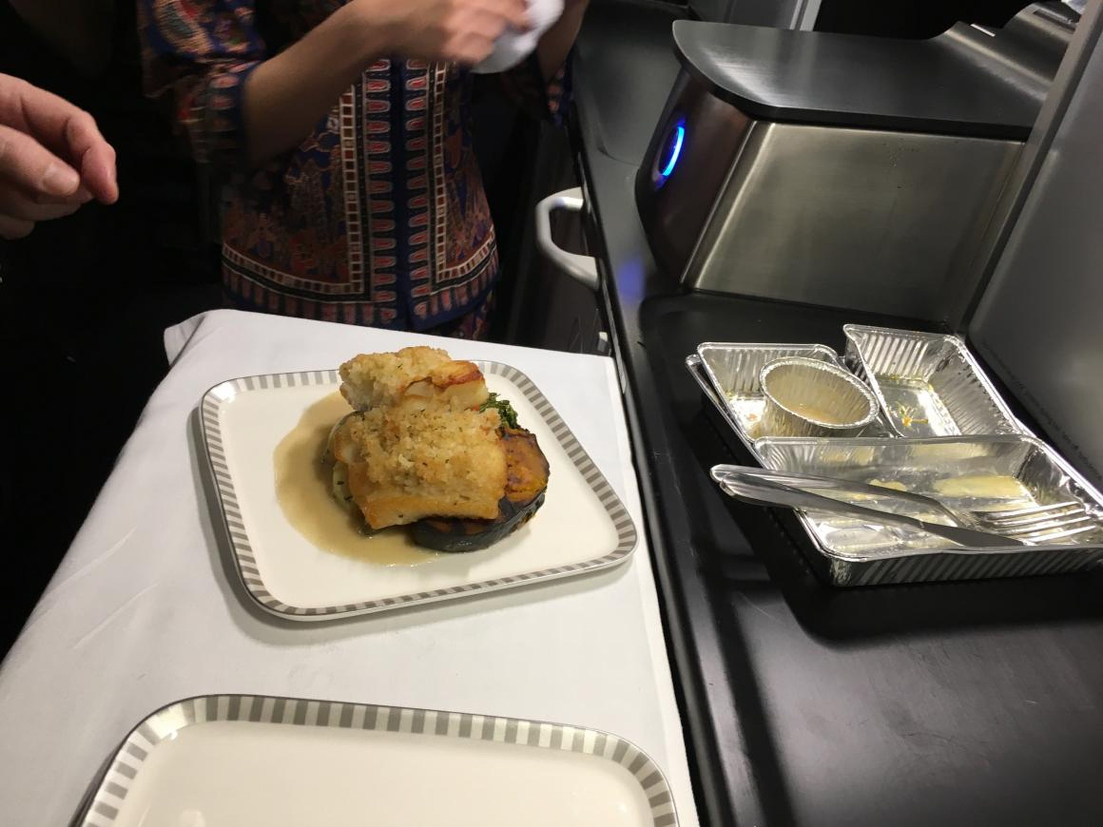 We chatted about the intricacies of delivering fine dining at 40,000 feet. The chef also demonstrated the proper procedure for plating dishes.