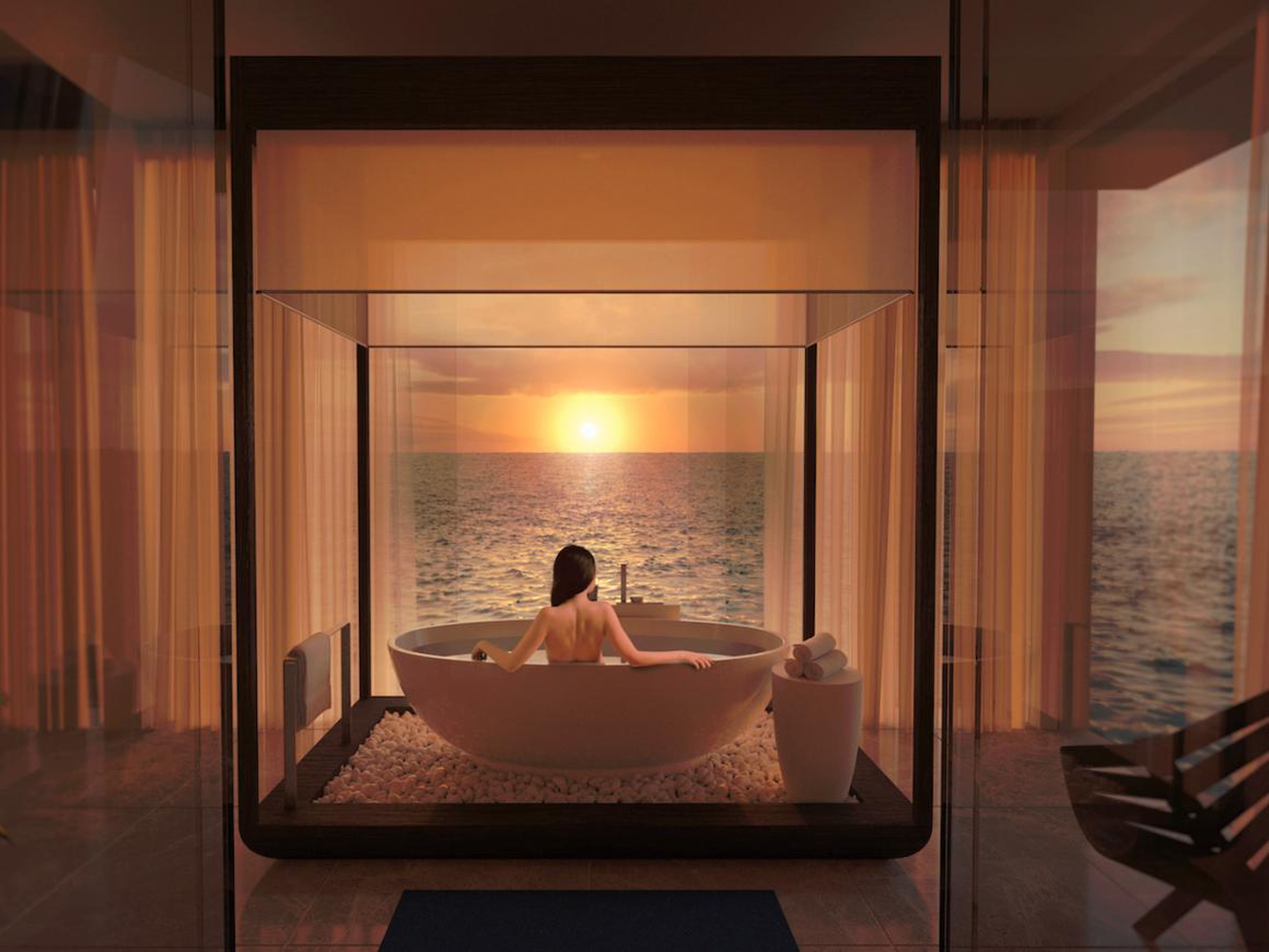 In addition to two bedrooms, the upper level has a bathroom with tub facing the ocean. But that's just one of many all-inclusive indulgences. There's a butler and chef for each suite, an on-call fitness trainer and spa treatments,