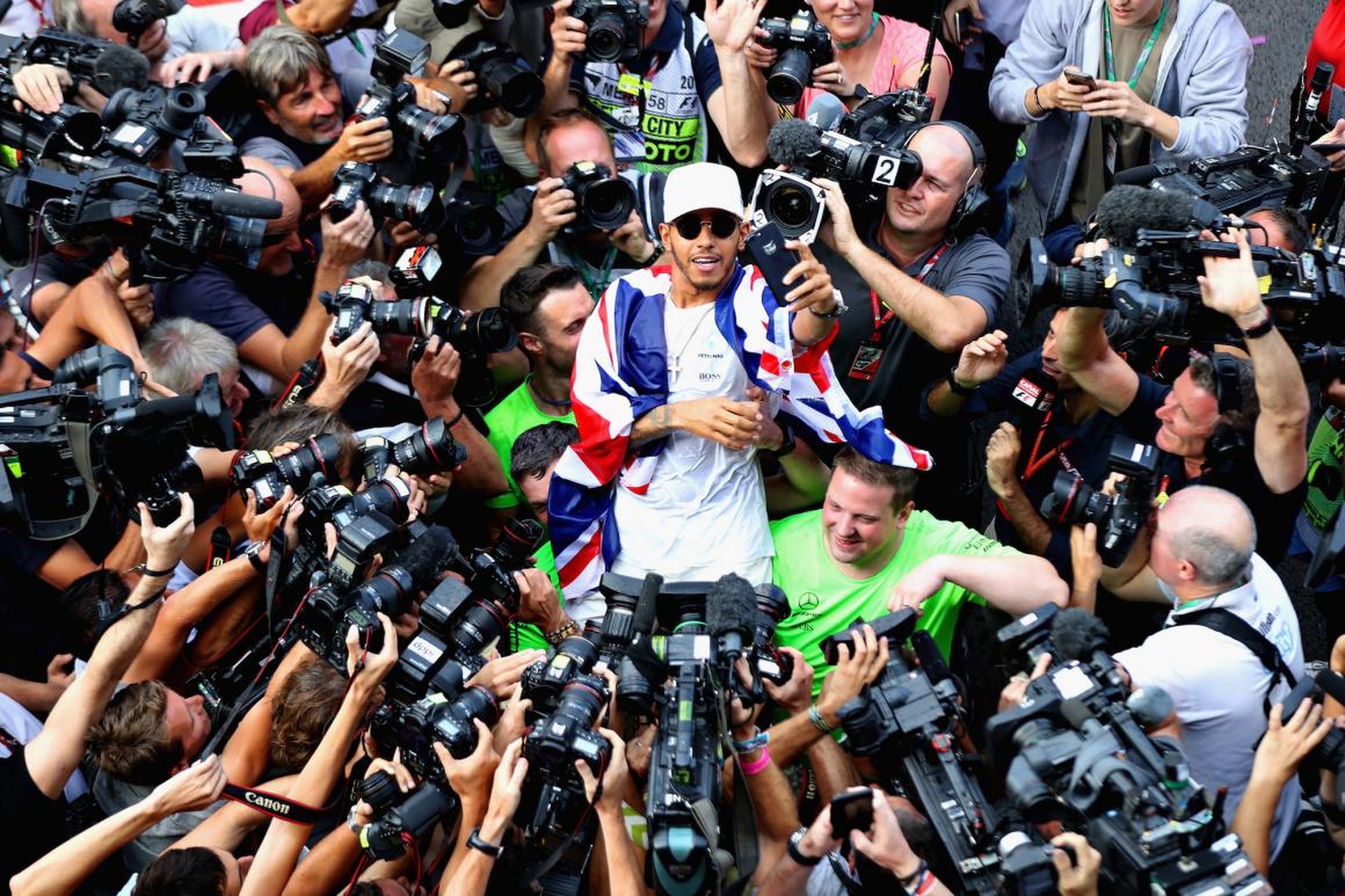 This is British racer Lewis Hamilton, who was recently crowned Formula 1 world champion for the fifth time.