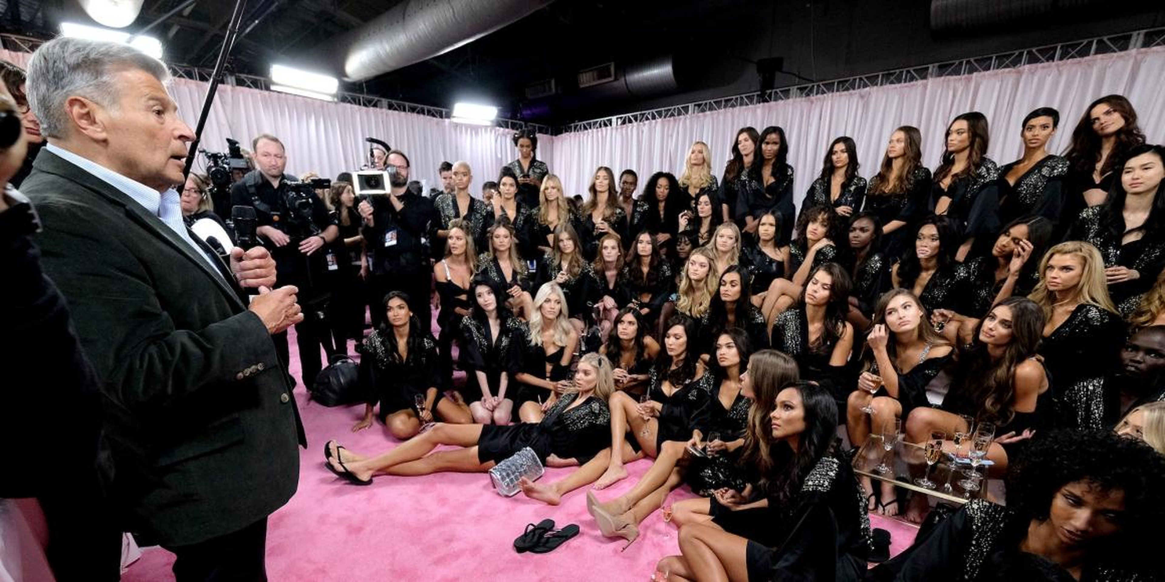 Ed Razek speaks to the 2018 Victoria's Secret runway models backstage during the 2018 Victoria's Secret Fashion Show at Pier 94 on November 8, 2018 in New York City.