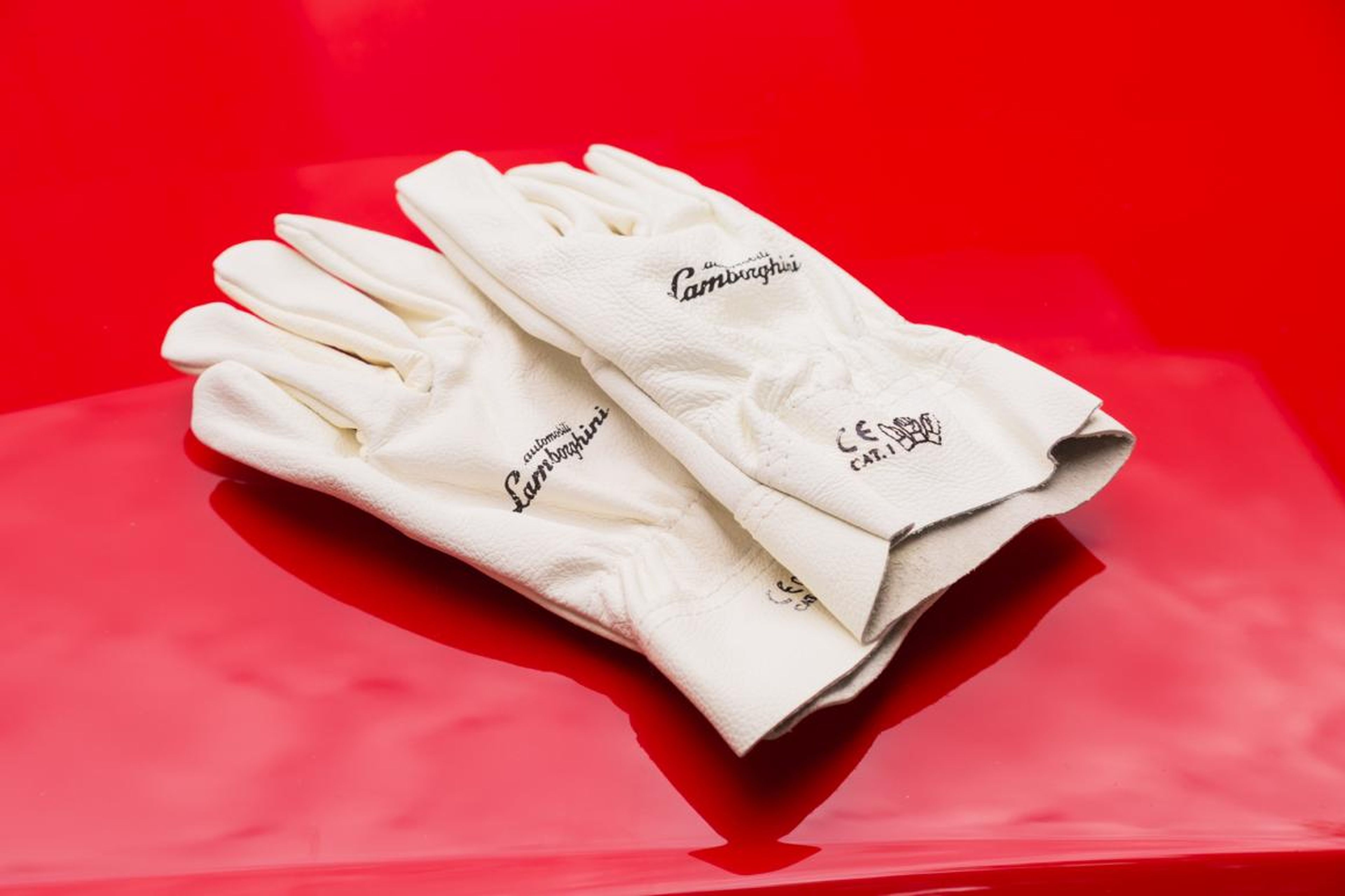For example, a pair of white leather Lamborghini-branded gloves.