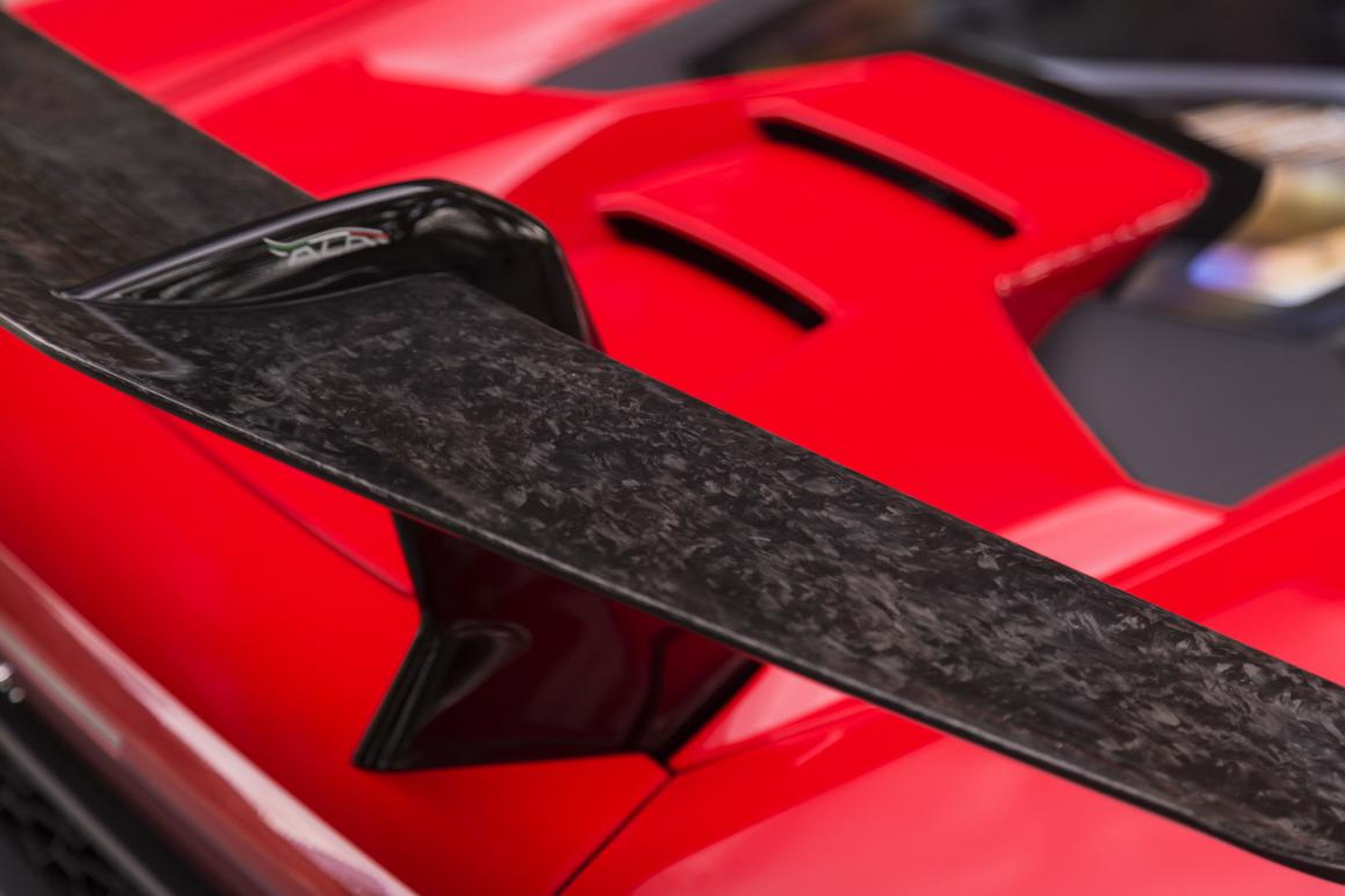 Look closely and you can see that it's made of Lamborghini's Forged Composite material, a type or carbon fiber that's compressed rather than woven. That's what accounts for the cool patterning.