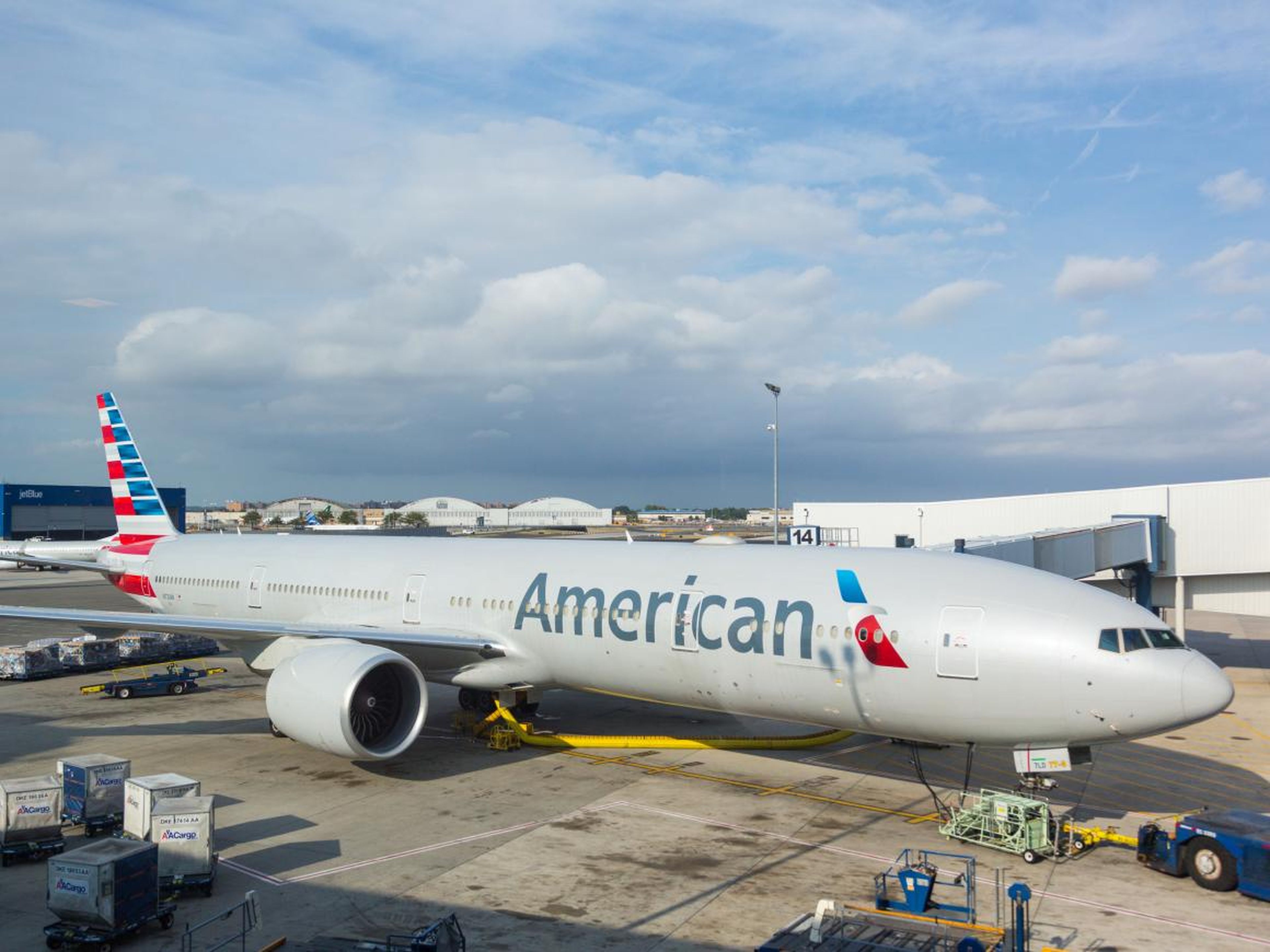 American Airlines Boeing 777 at New York JFK airport before boarding passengers.