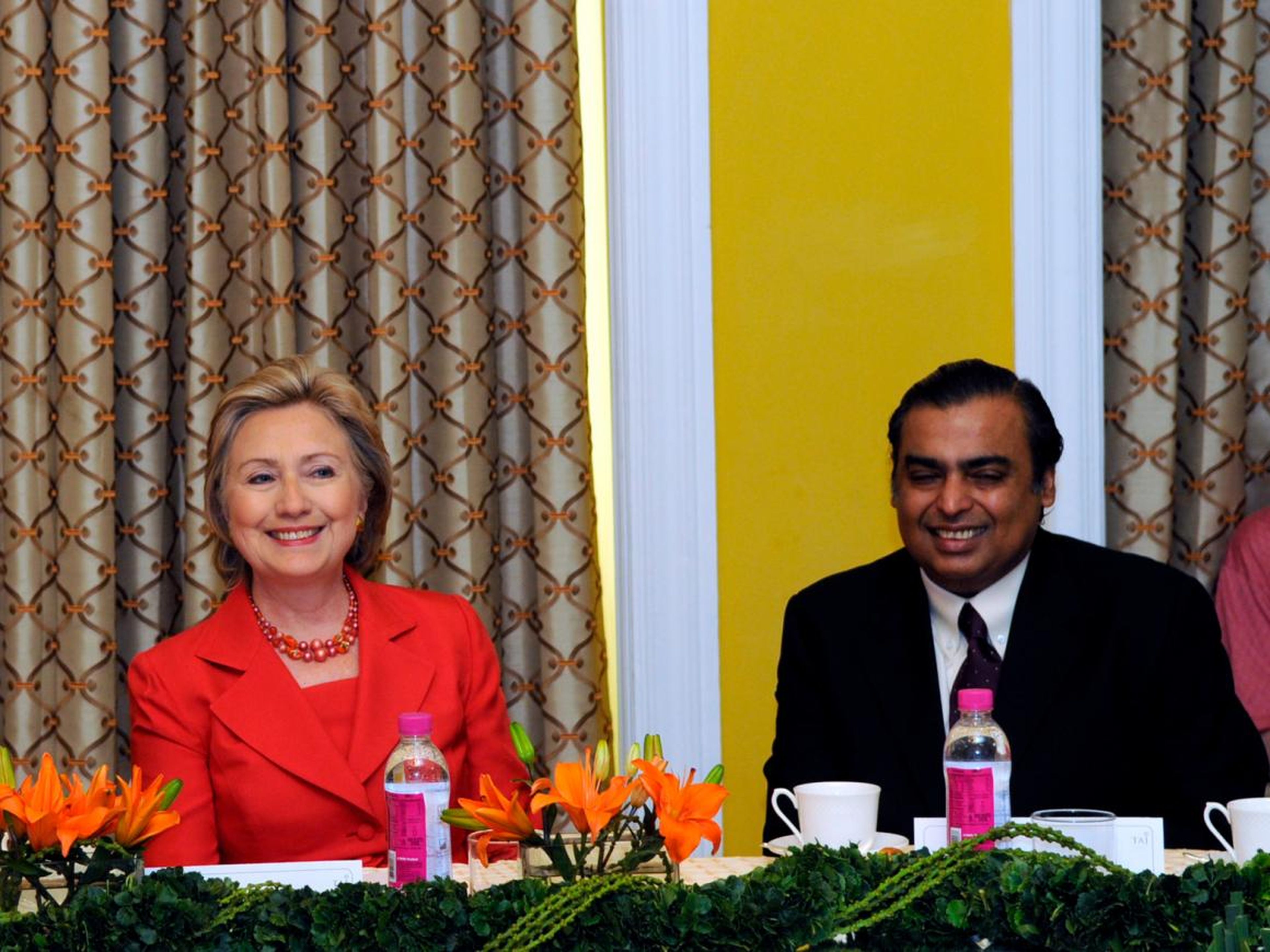 Hillary Clinton and Mukesh Ambani in Mumbai in 2009.