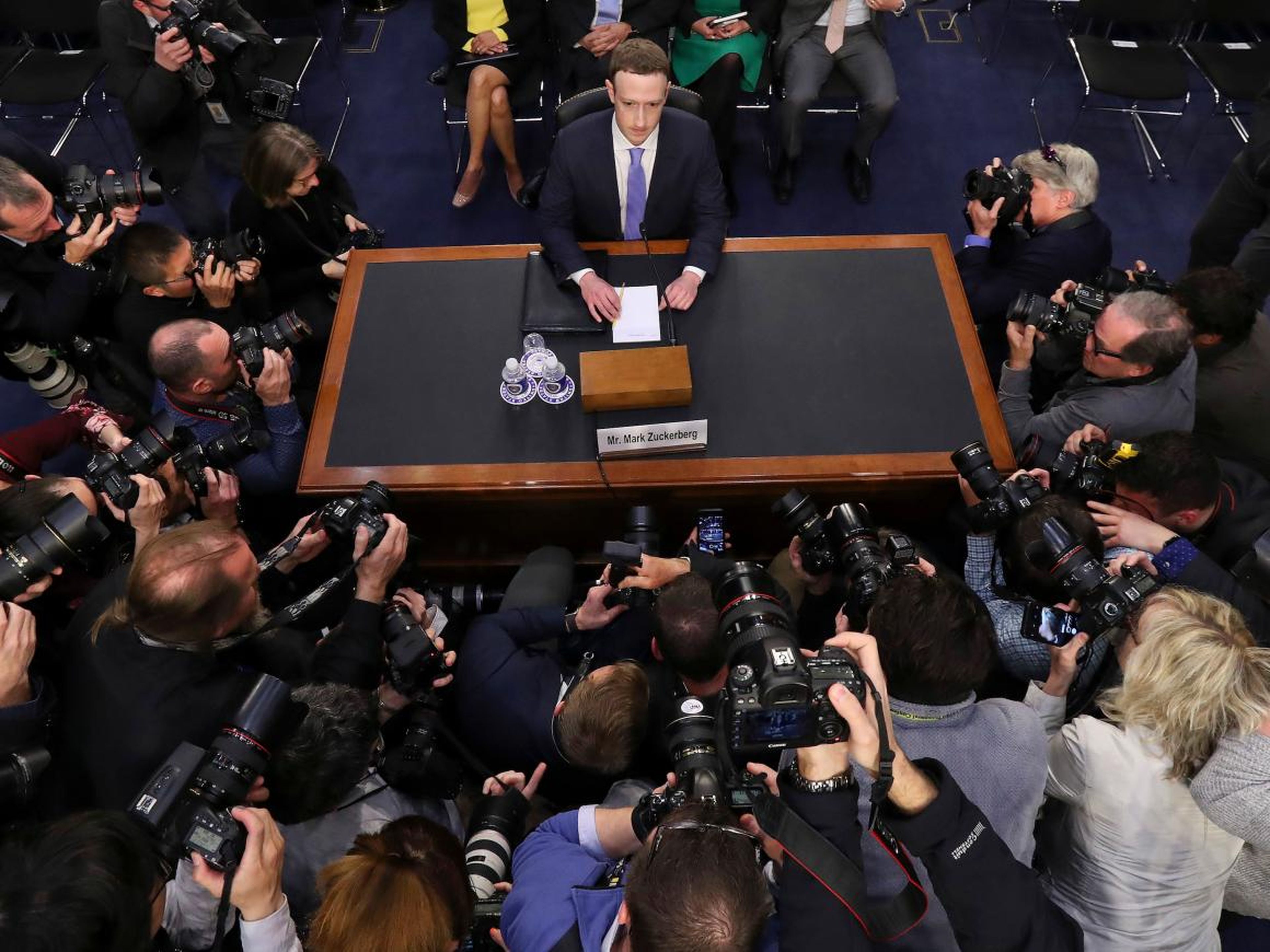 APRIL: Facebook CEO Mark Zuckerberg stares down a scrum of the world's media during his appearance in Congress.
