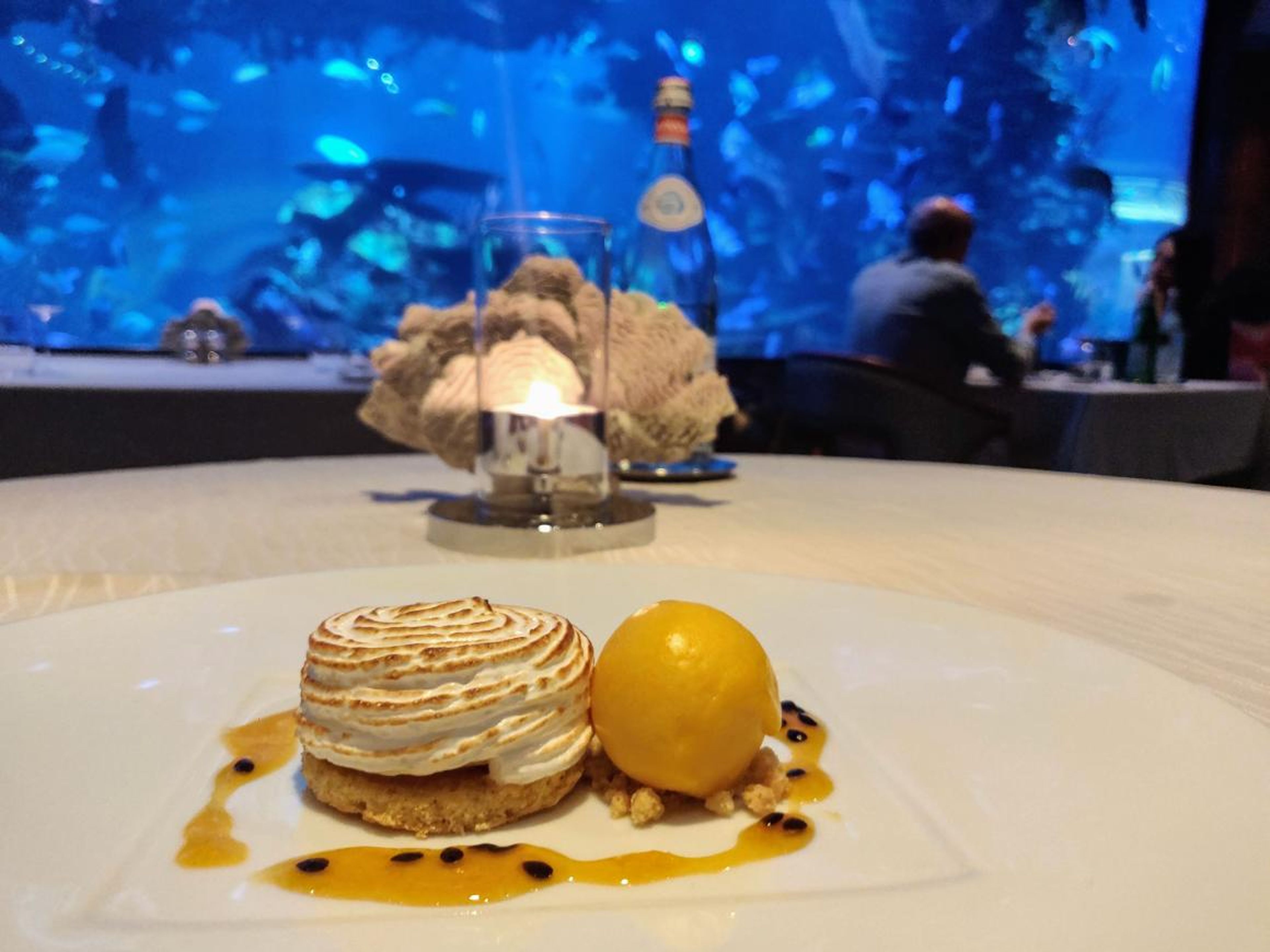 For dessert — I was so stuffed that I can't believe I even ordered it — I had the passionfruit baked Alaska with mango sorbet ($26). After the taste-bud overkill of the fried oysters and truffle-topped lobster, the mellow, sweet