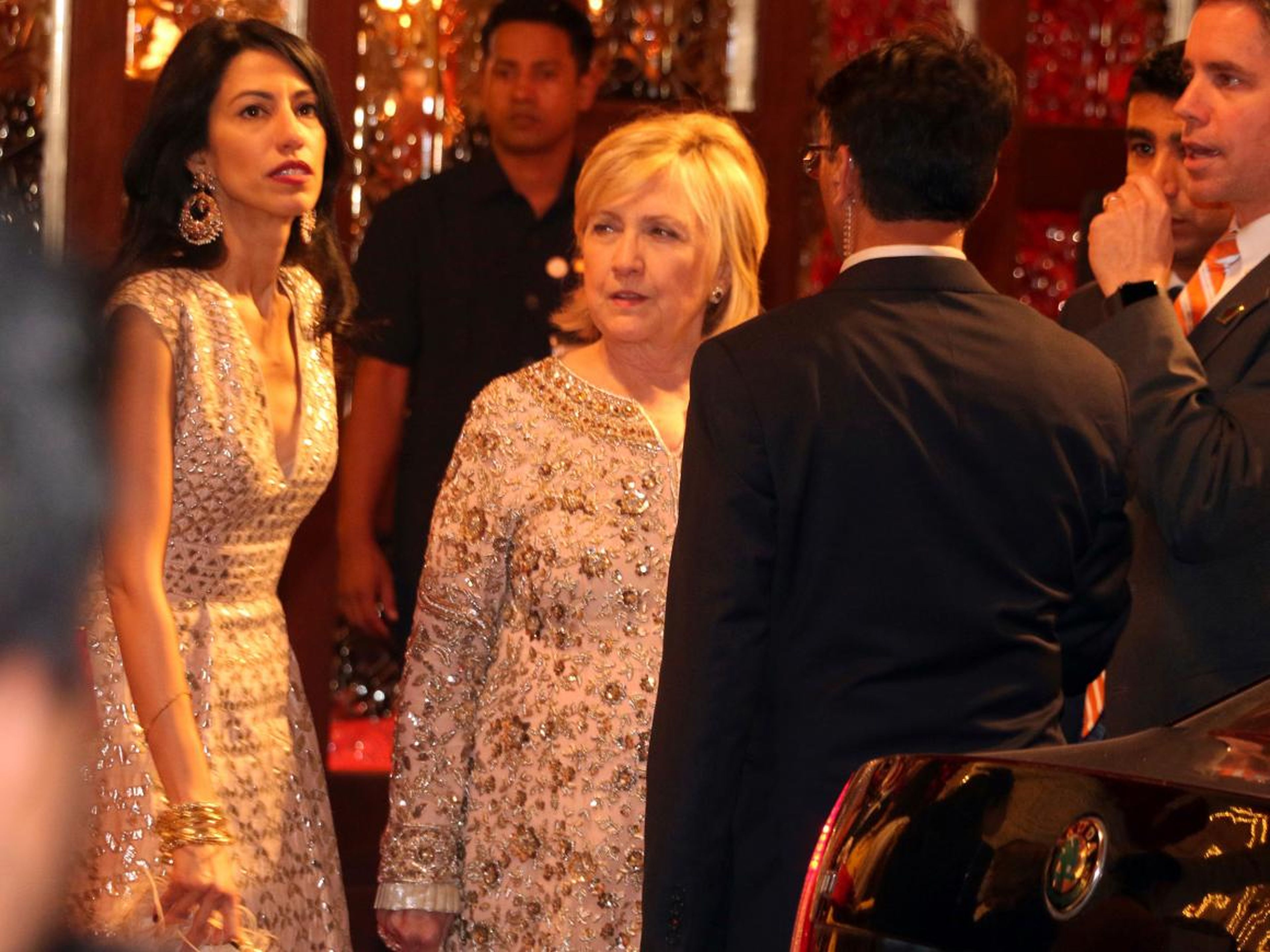 ... including former Secretary of State and presidential candidate Hillary Clinton with her longtime aide, Huma Abedin ...
