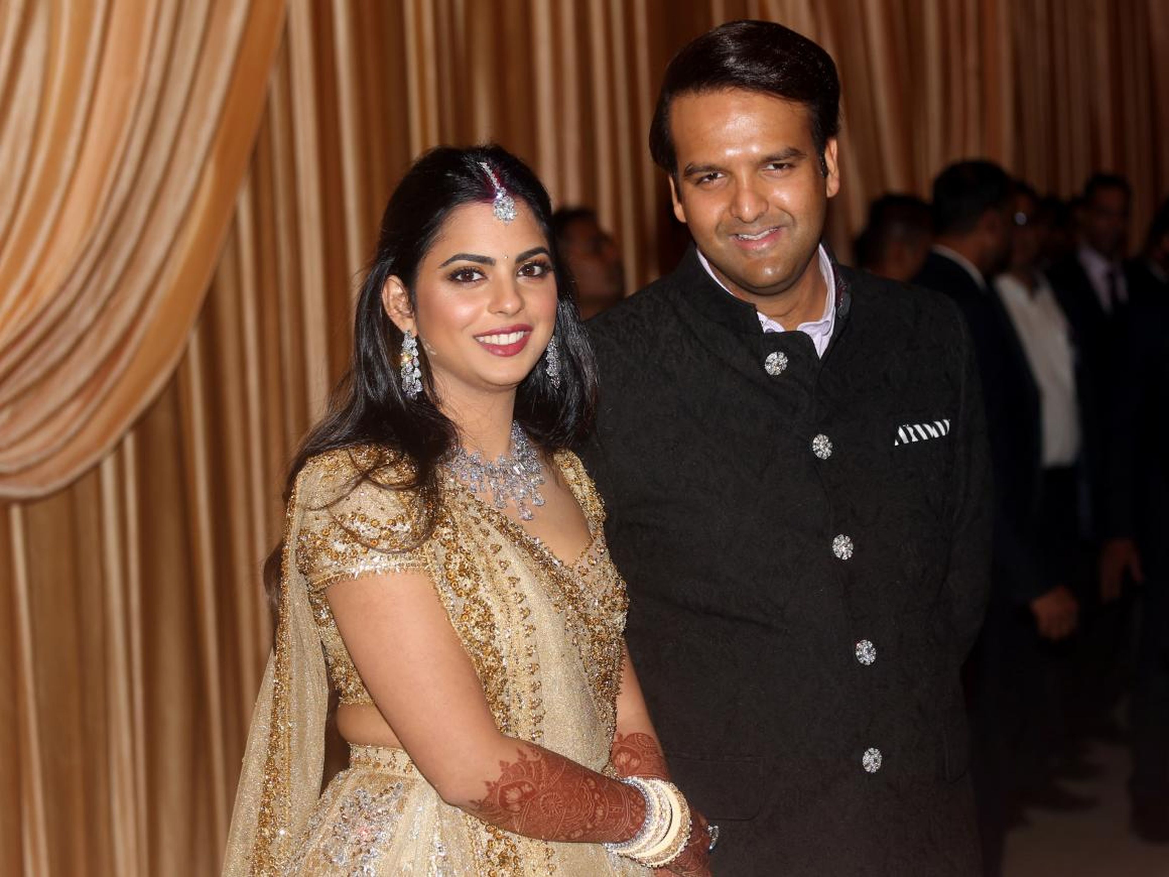 Isha Ambani and her husband Anand Piramal at their wedding reception in Mumbai, India, December 14, 2018.